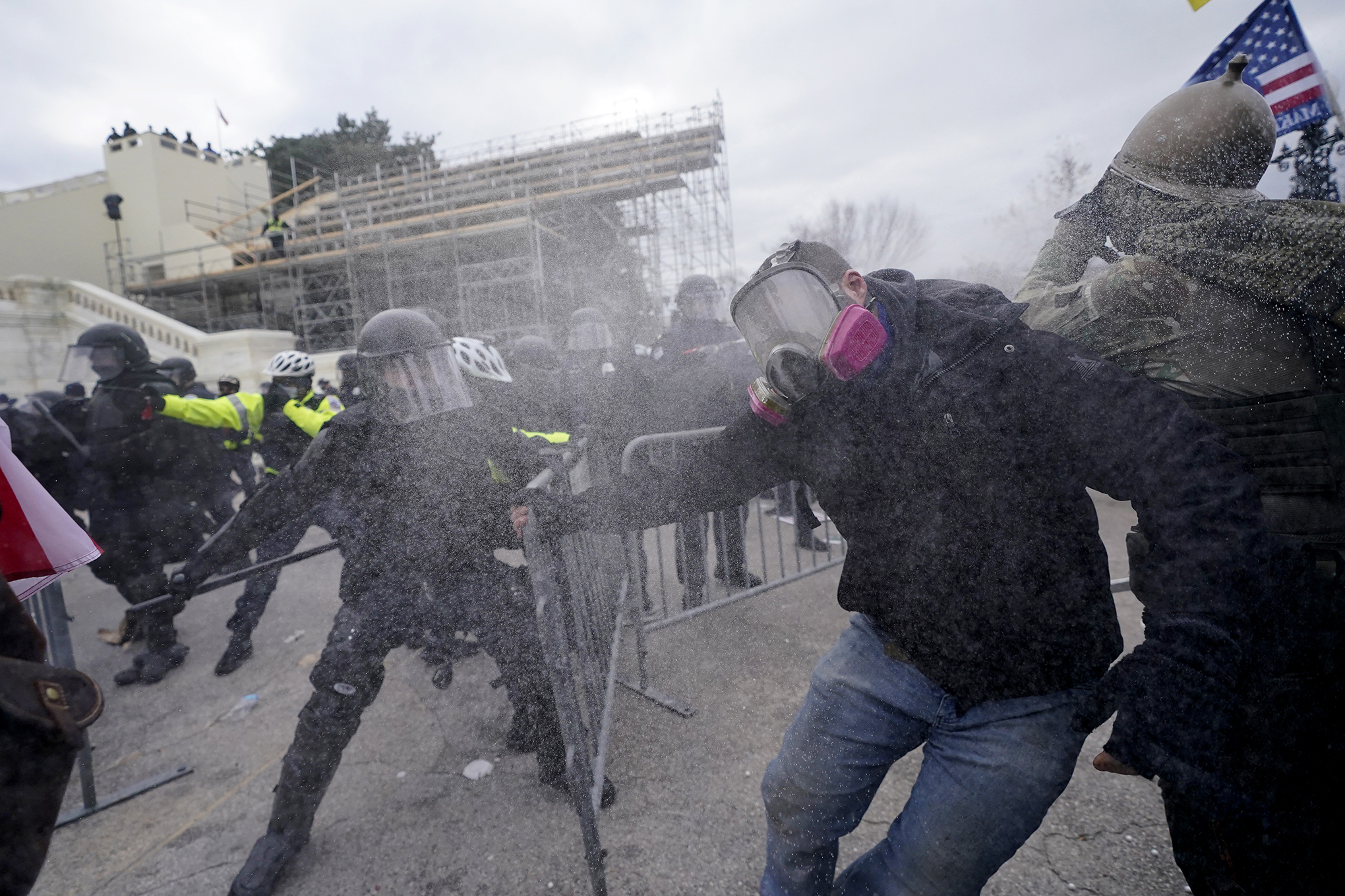 Trump supporters try to break through a police barrier, Wednesday, Jan. 6, 2021
