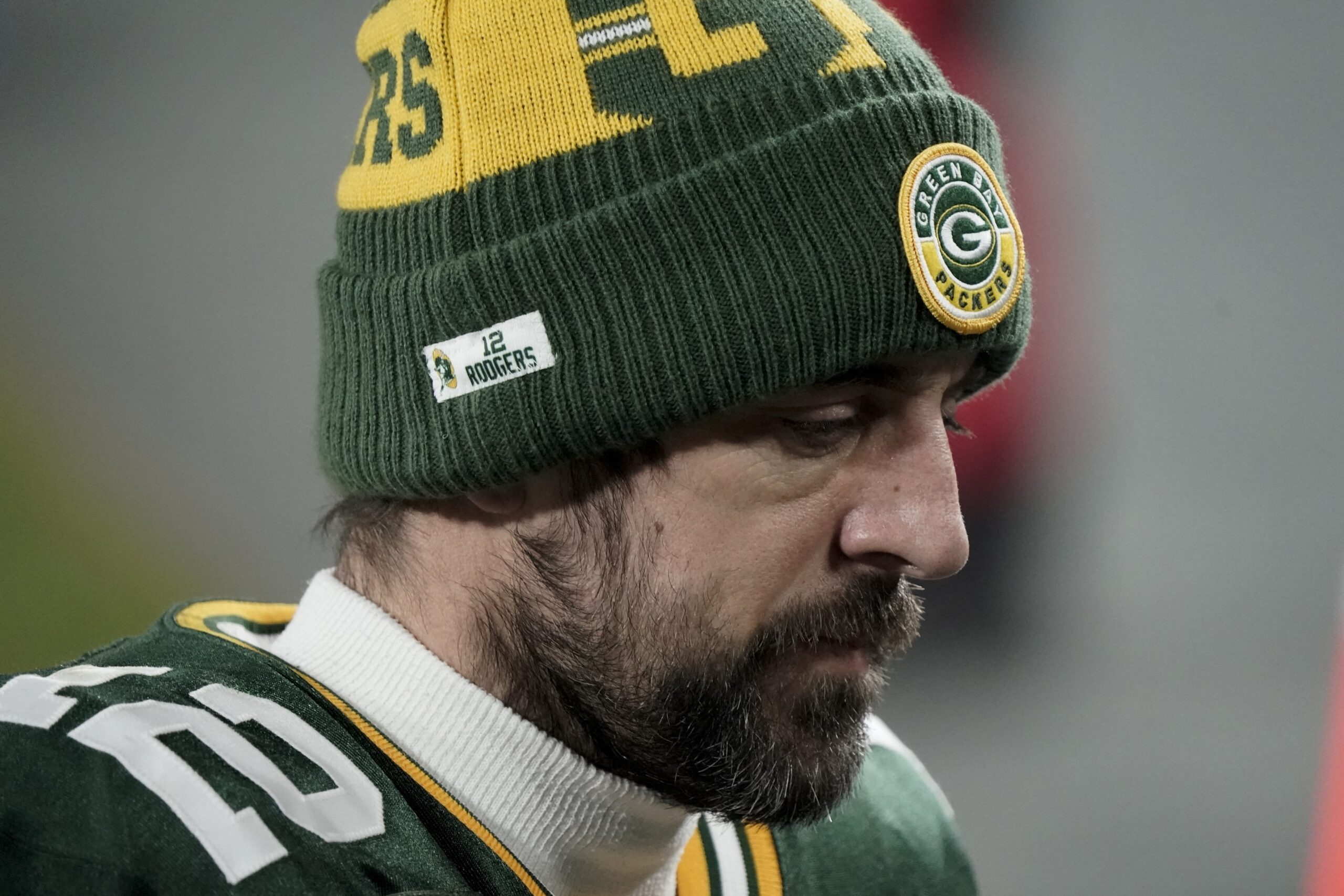 Green Bay Packers quarterback Aaron Rodgers walks off the field