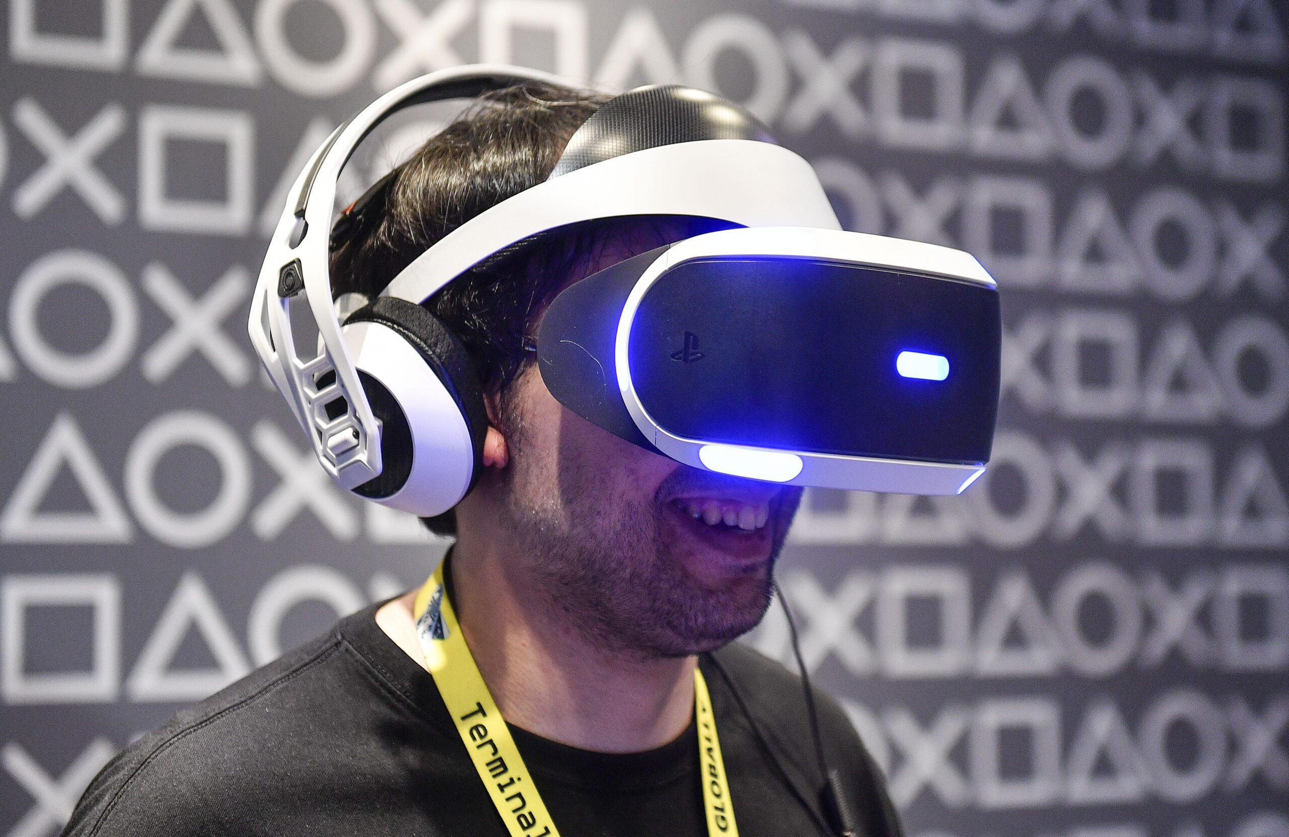 A man tests a Sony PlayStation Virtual Reality headset.