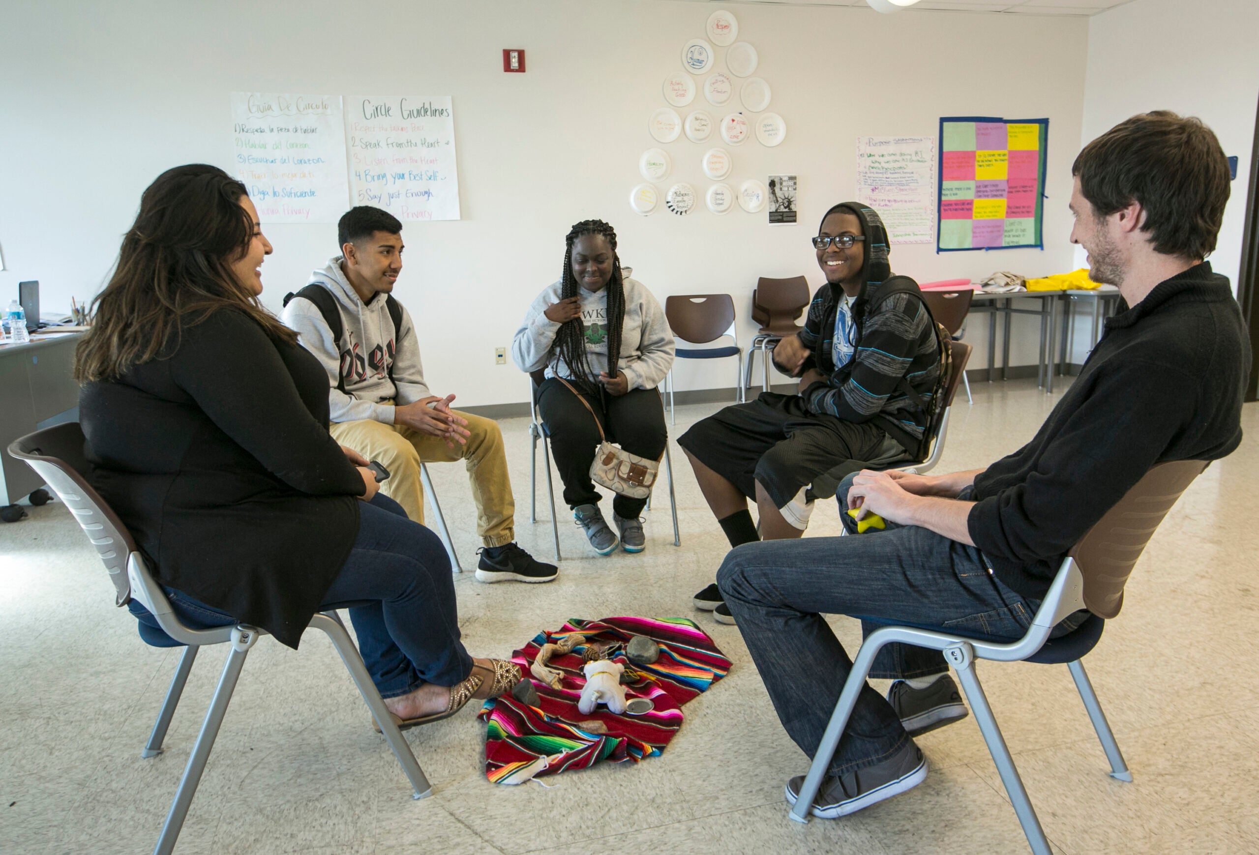 High school students attend a circle session at restorative justice class at the Augustus F. Hawkins High School in Los Angeles
