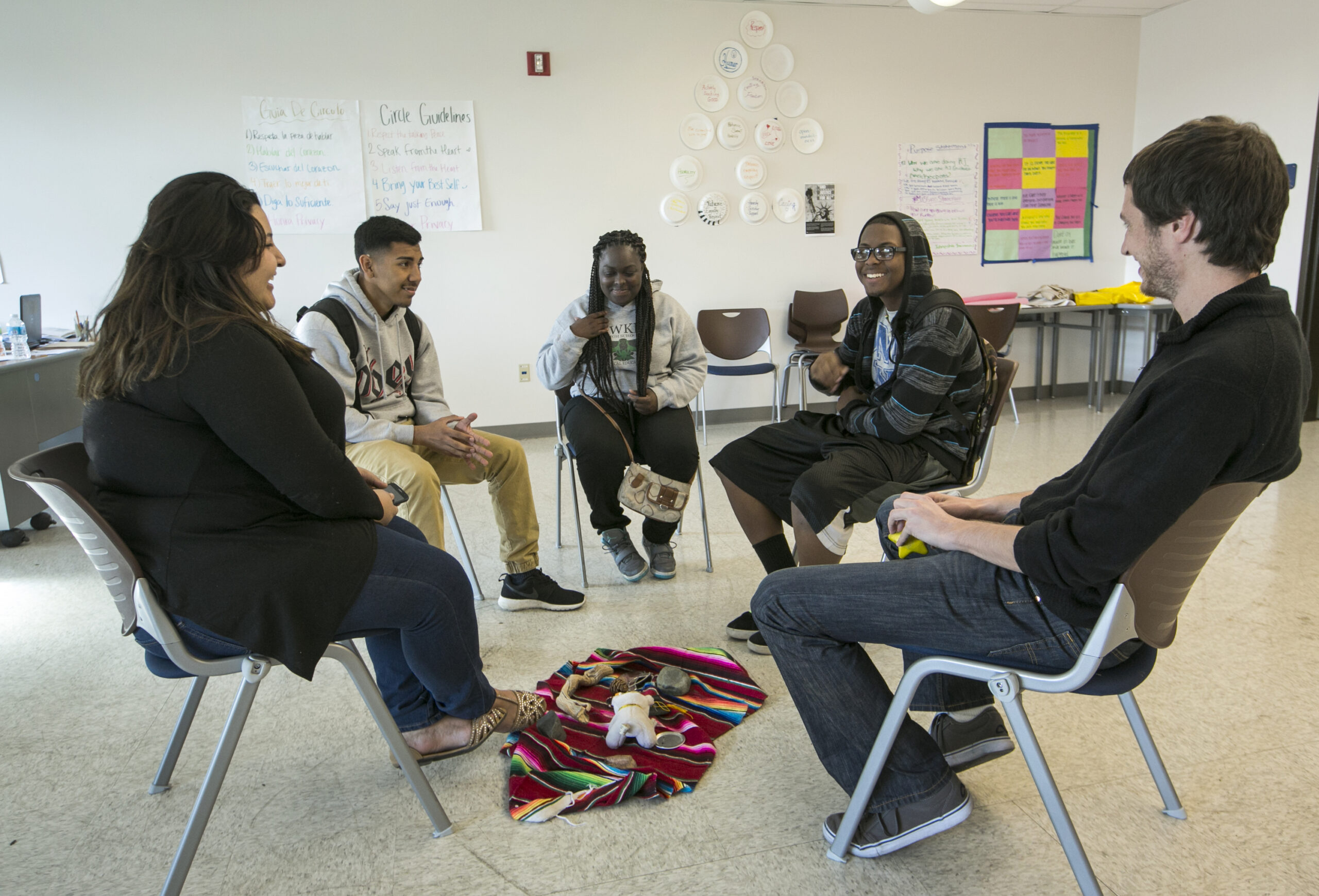 High school students attend a circle session at restorative justice class at the Augustus F. Hawkins High School in Los Angeles