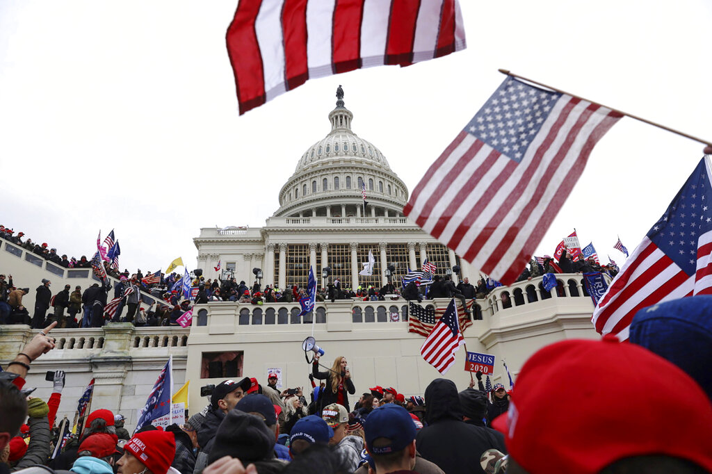 Supporters of President Donald Trump gather outside the U.S. Capitol