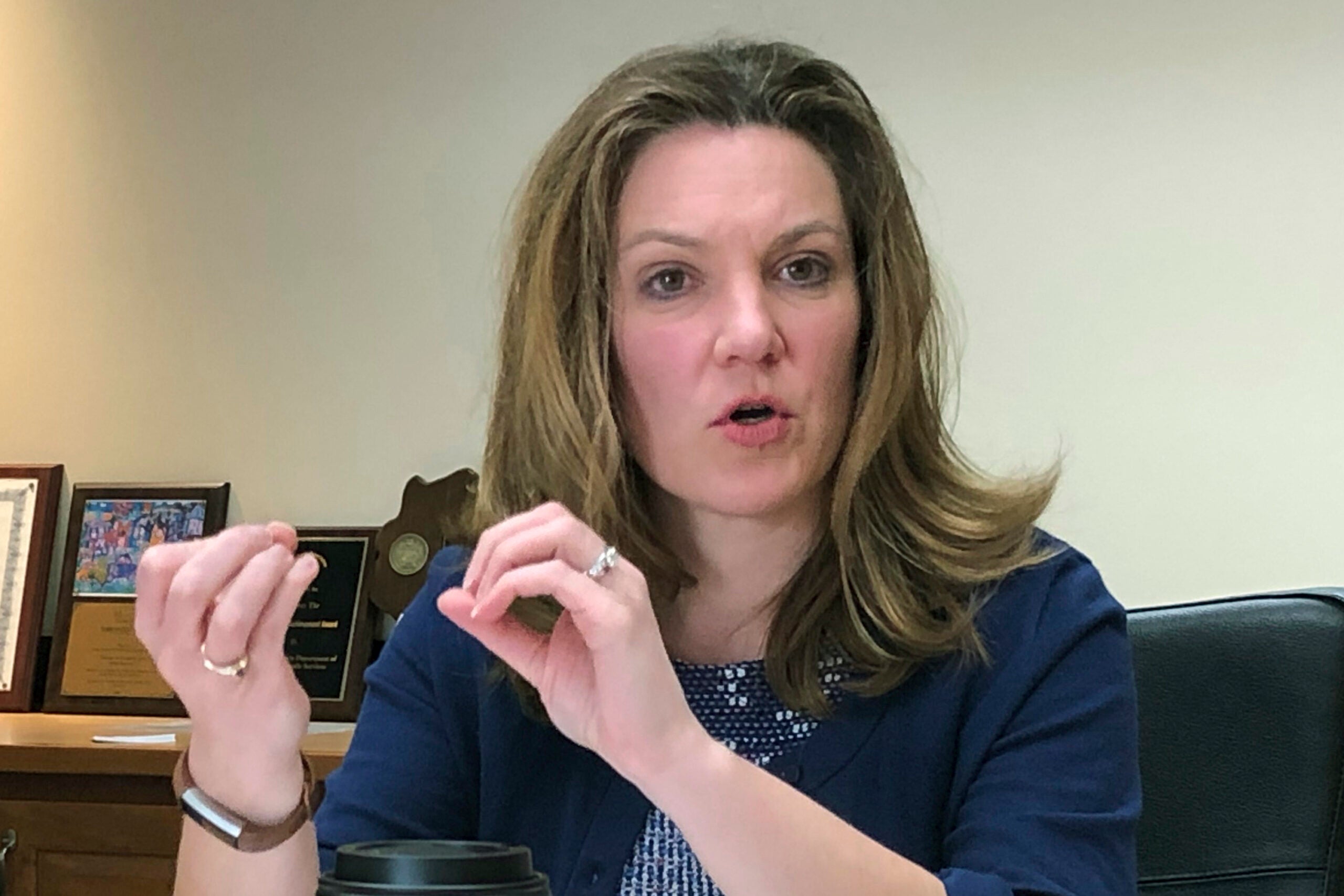 Andrea Palm at a desk