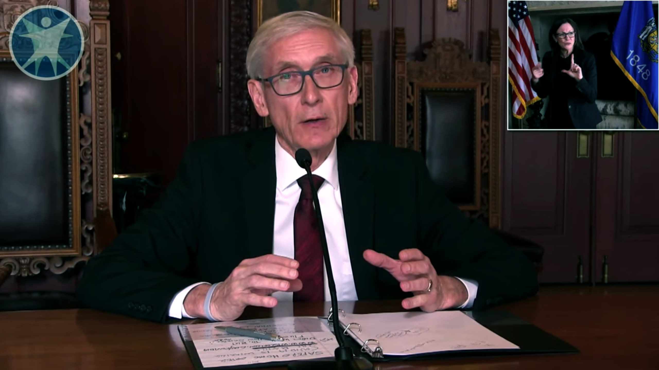 Gov. Tony Evers answering reporters’ questions by video and teleconference