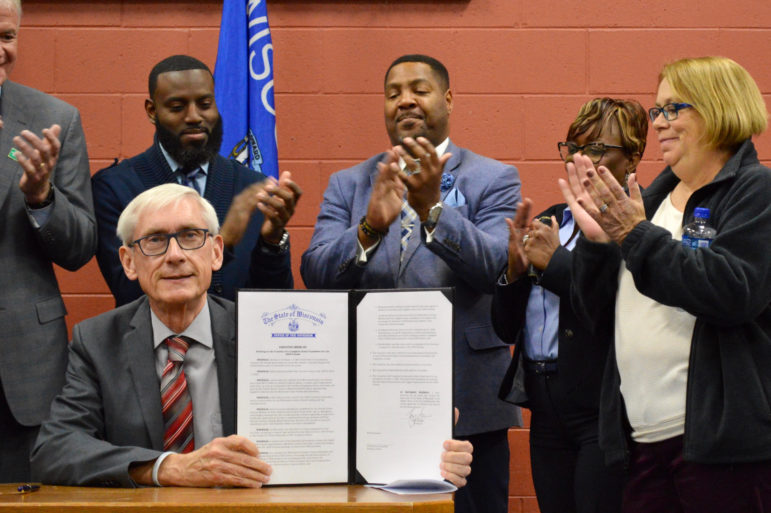 Gov. Tony Evers signs an executive order for a Complete Count Committee for the 2020 census