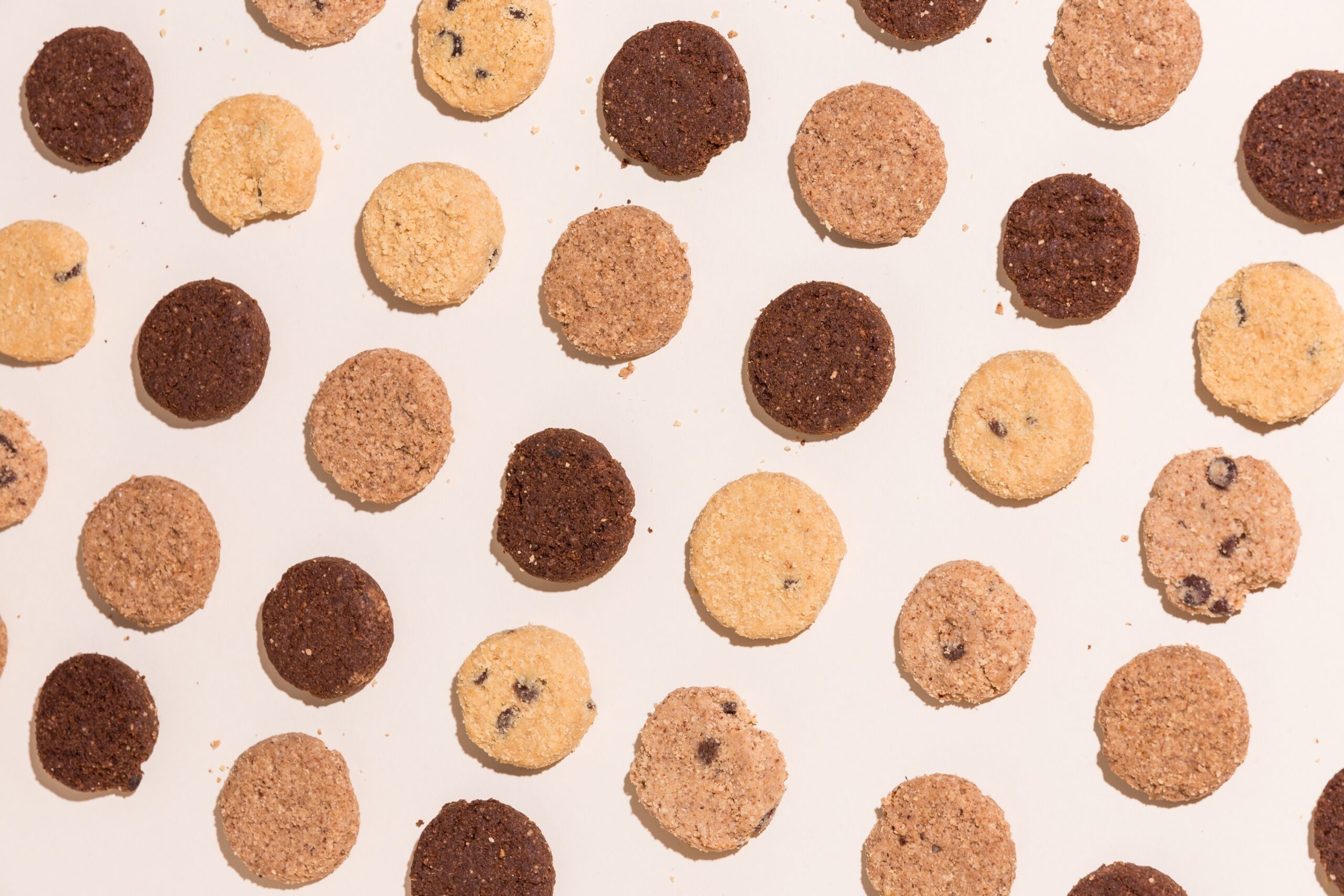 A grid of cookies alternate between light and dark colored treats.
