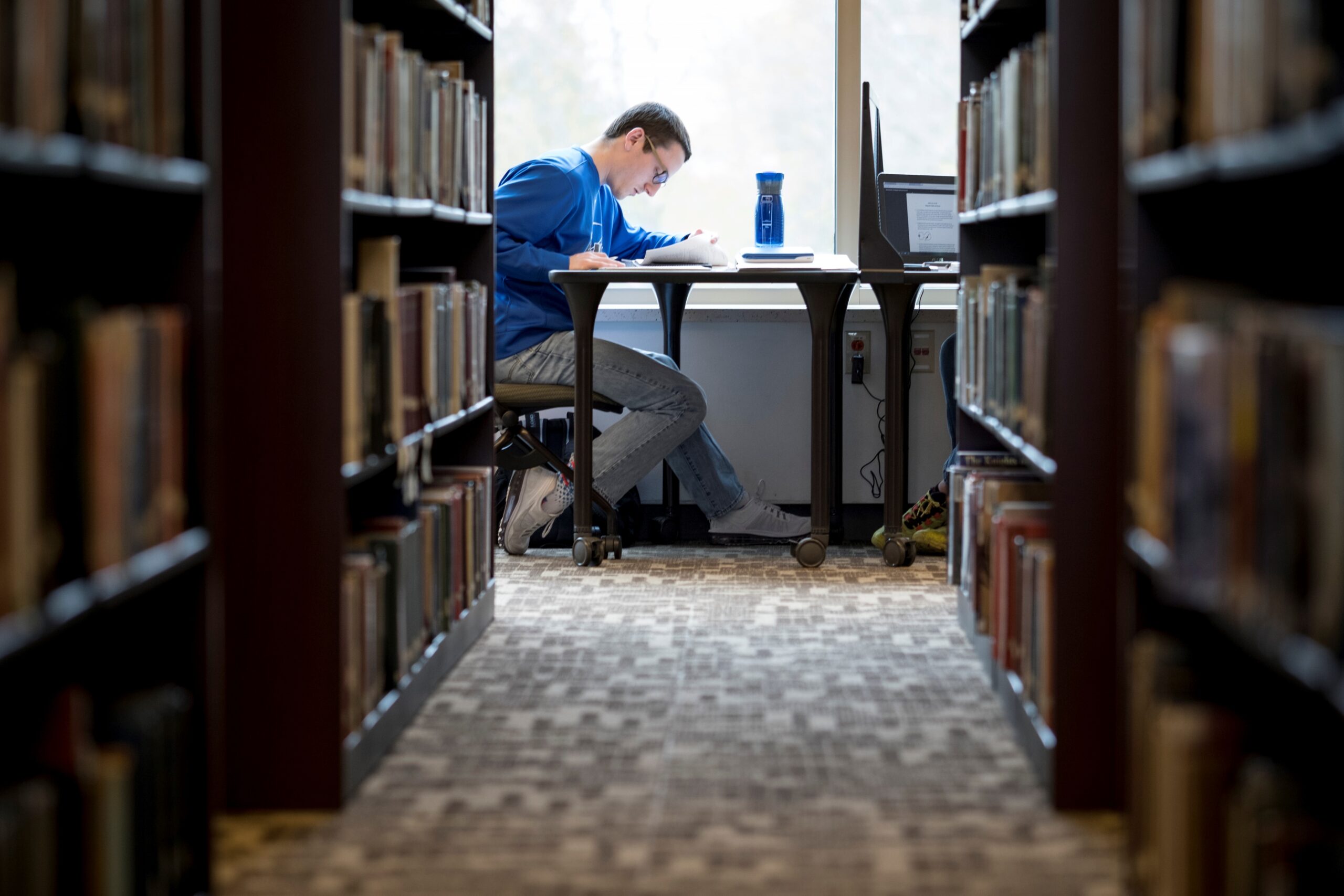 A student studies at St. Norbert College in De Pere.