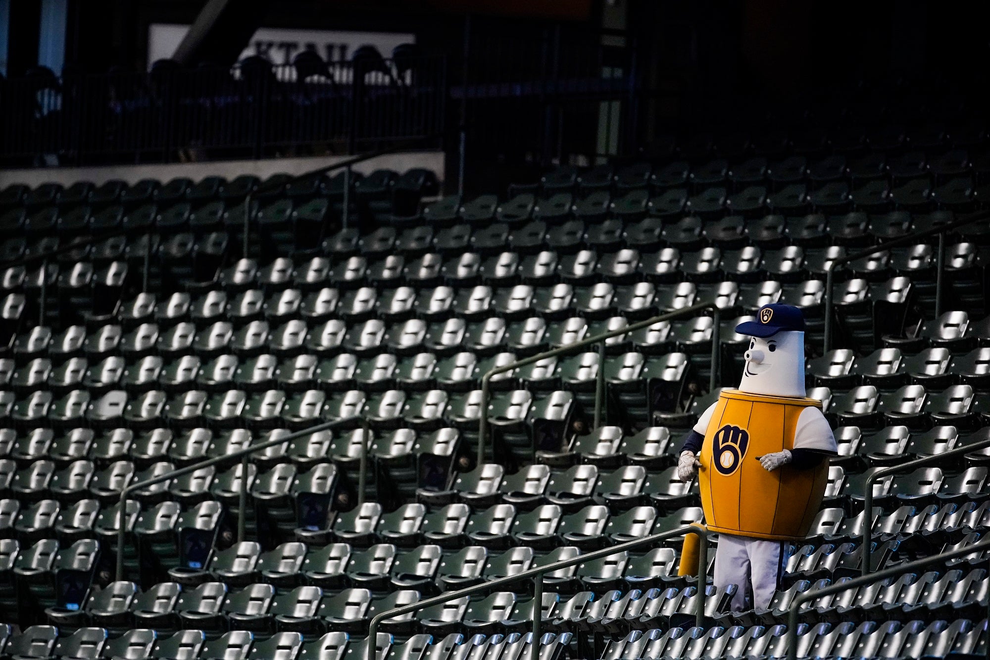 The Milwaukee Brewers mascot cheers alone in the stands