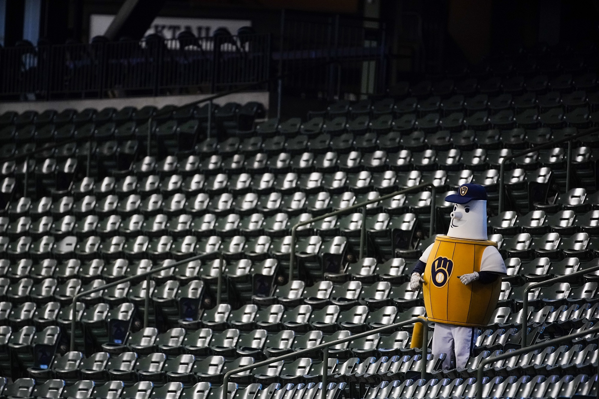 The Milwaukee Brewers mascot cheers alone in the stands