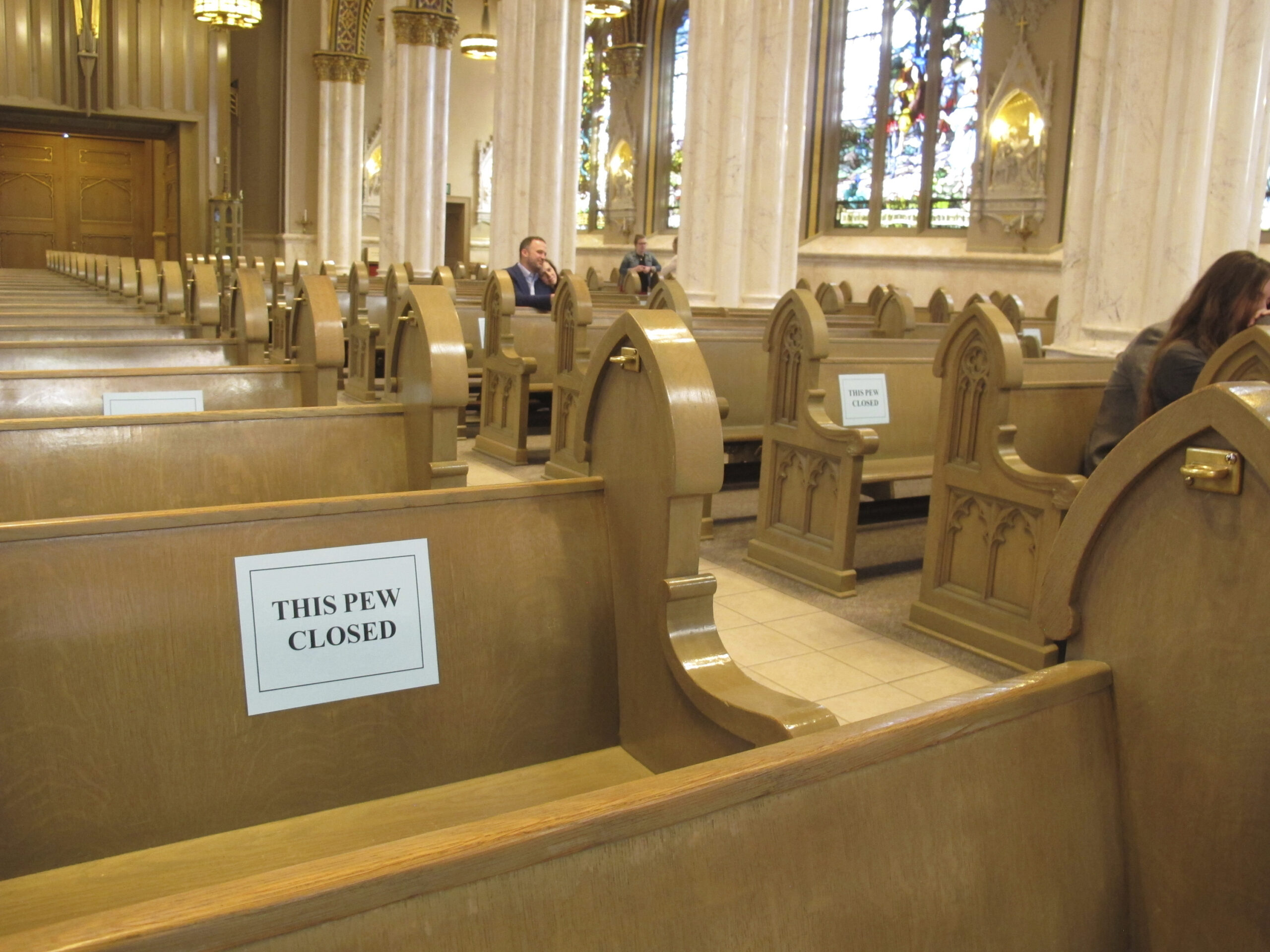 Half of the pews were closed to congregants as services resumed at the Cathedral of St. Helena