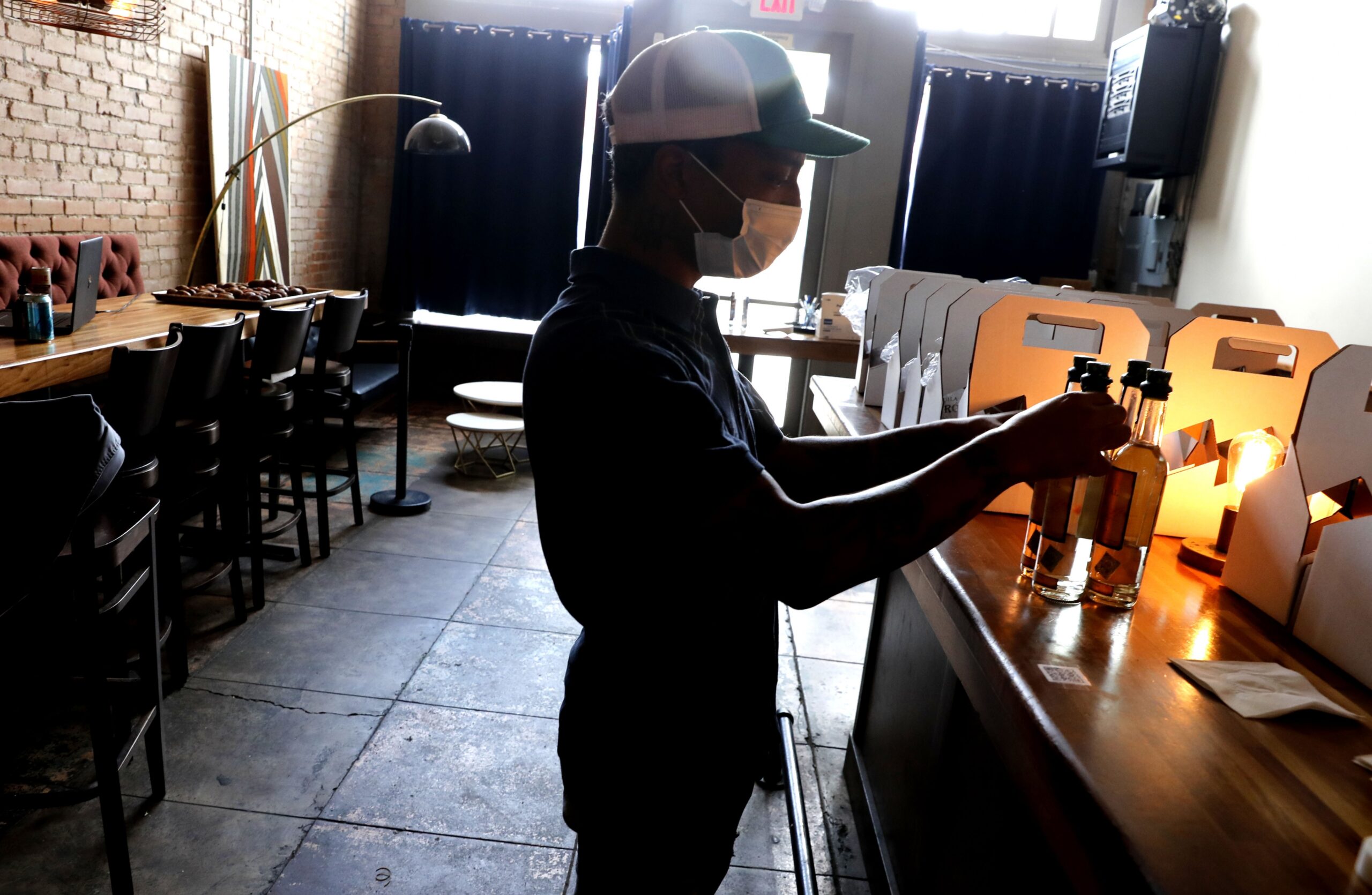 A man works in a restaurant during the COVID-19 pandemic