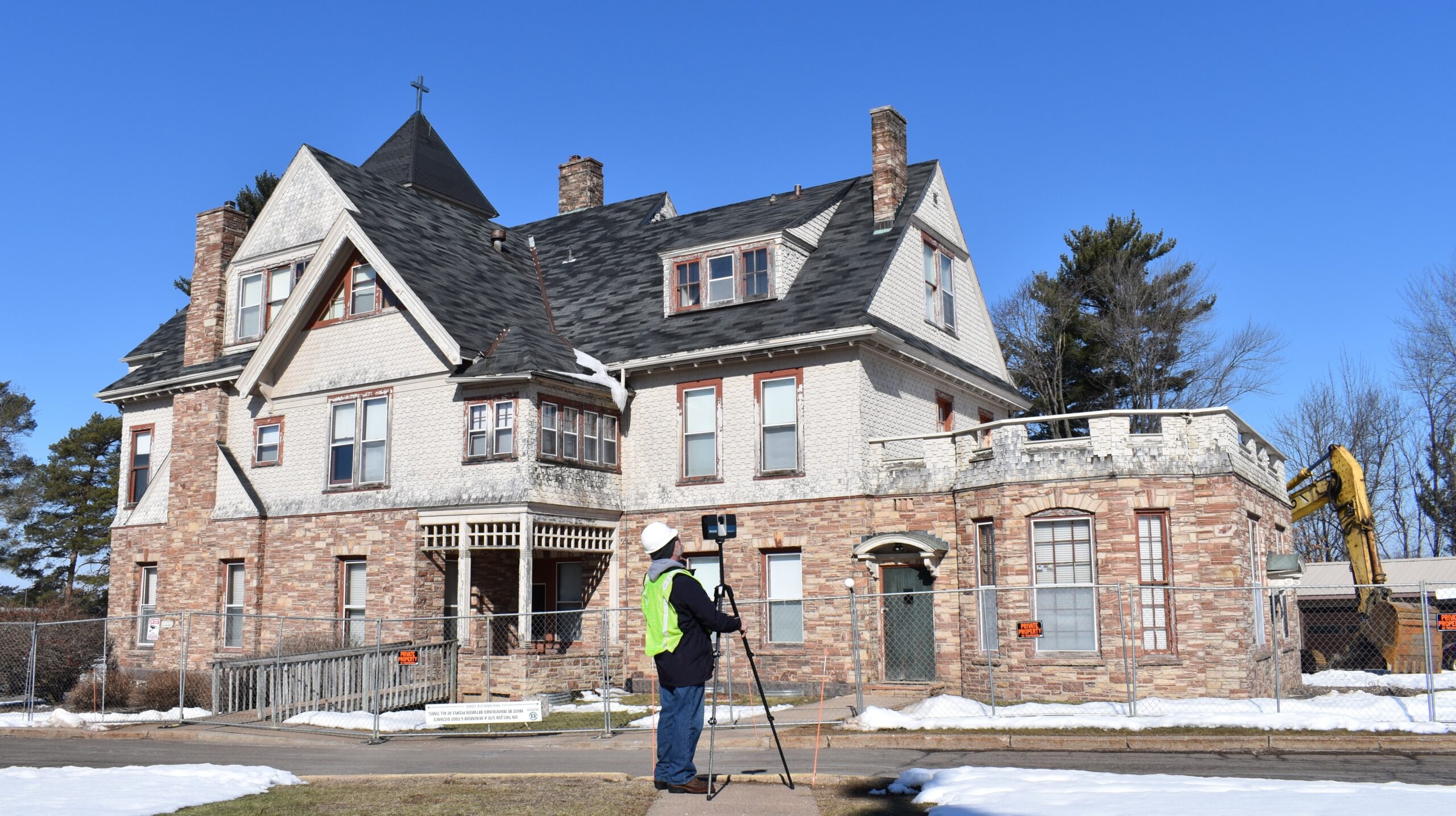 William Krueger of the University of Wisconsin-Milwaukee takes a digital laser-scan of the T.B. Scott Mansion in Merrill.