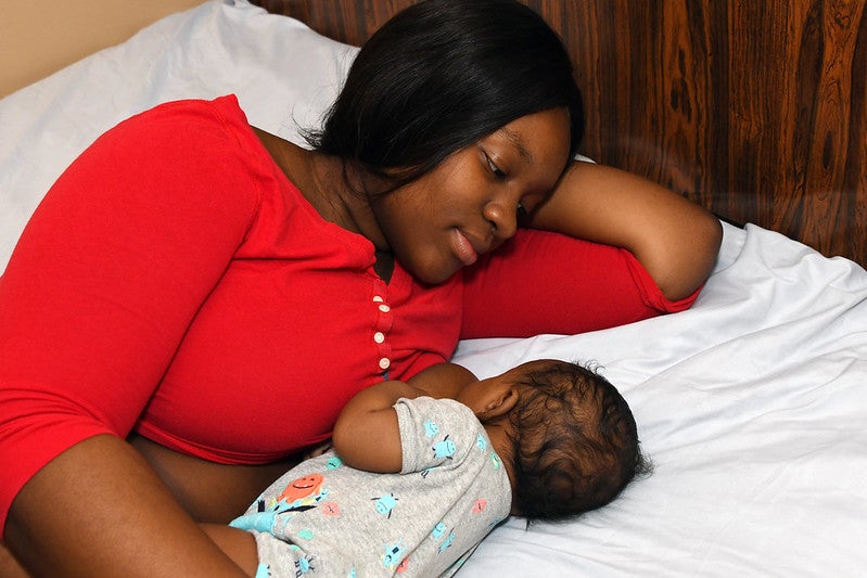 A Black mother and her child.