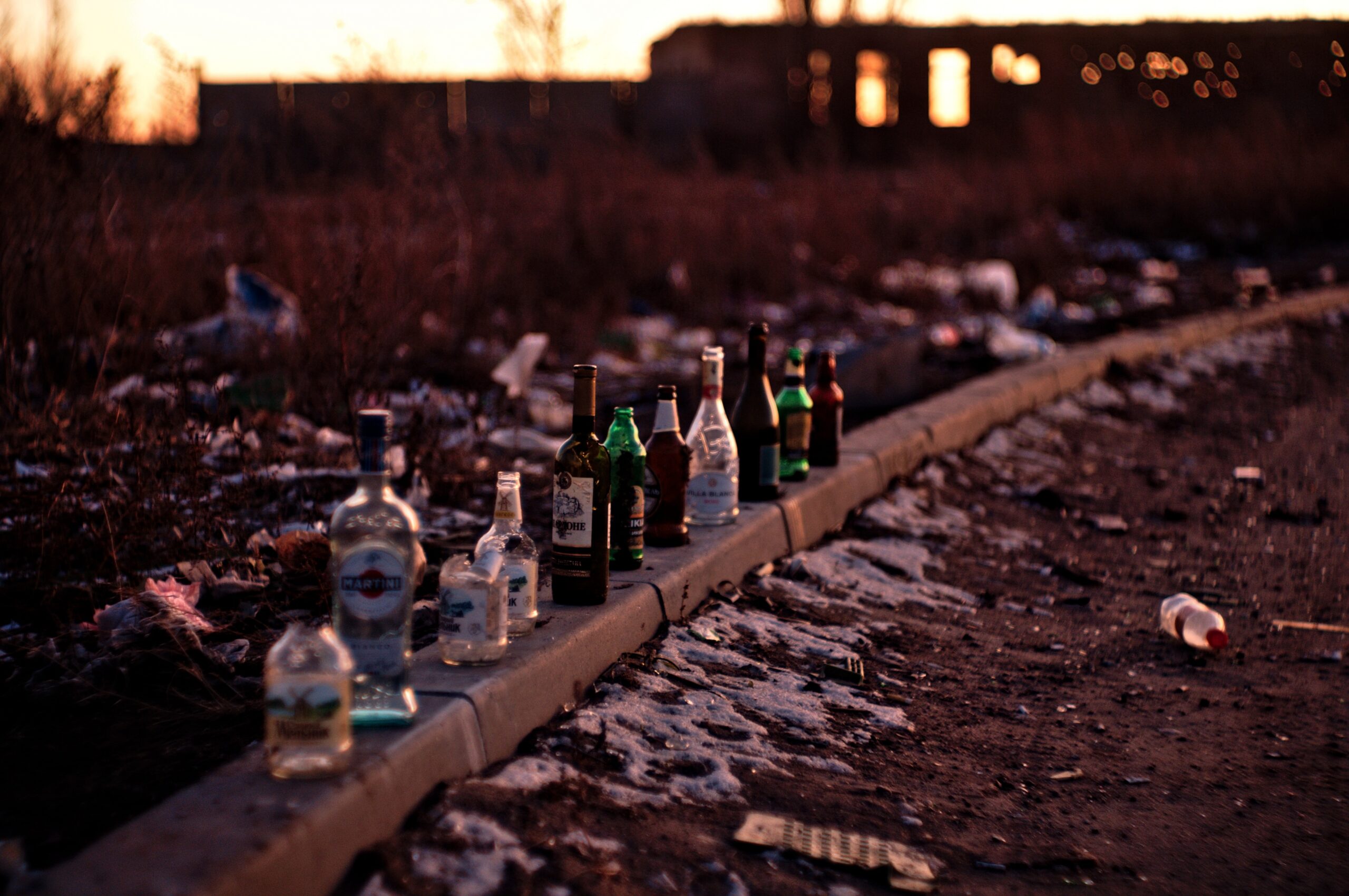 Empty bottles on railroad track