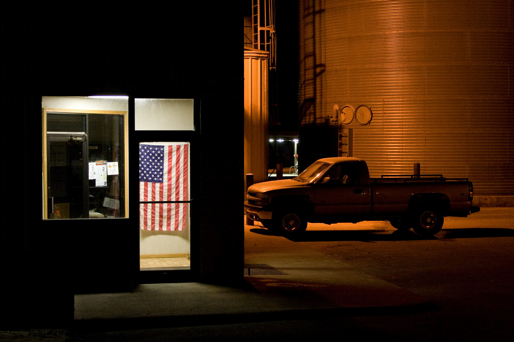 American flag in office at night