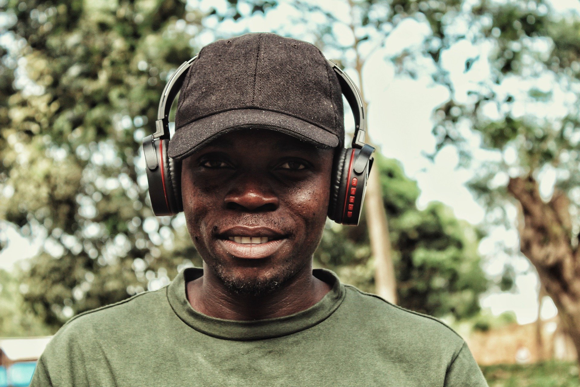 Man smiling and wearing headphones