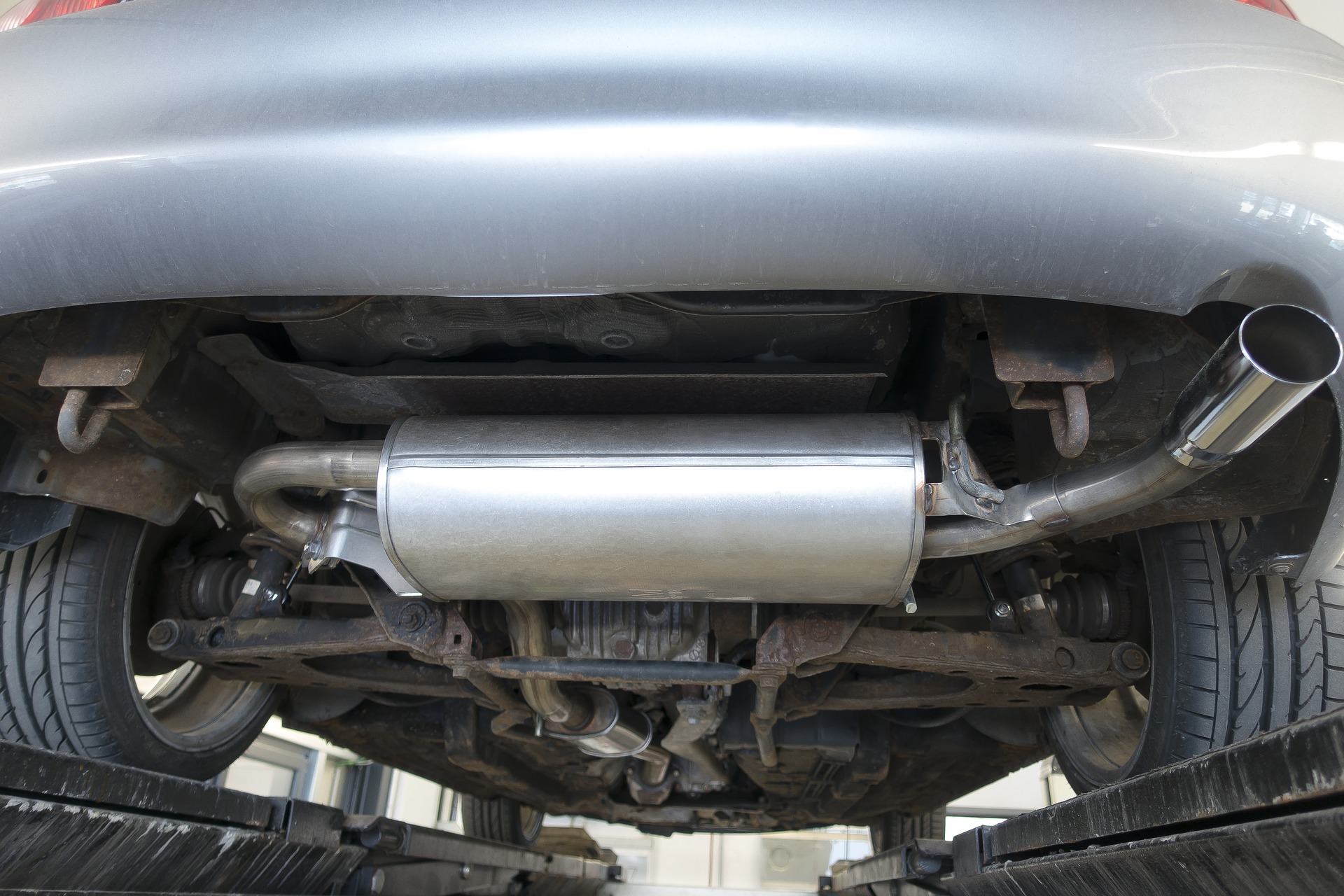 Exhaust system under a car.