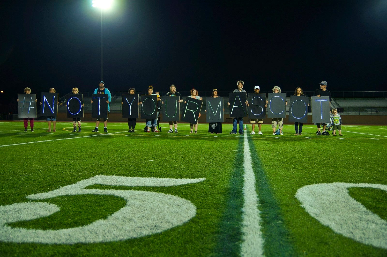 Group protesting use of Native American mascots.