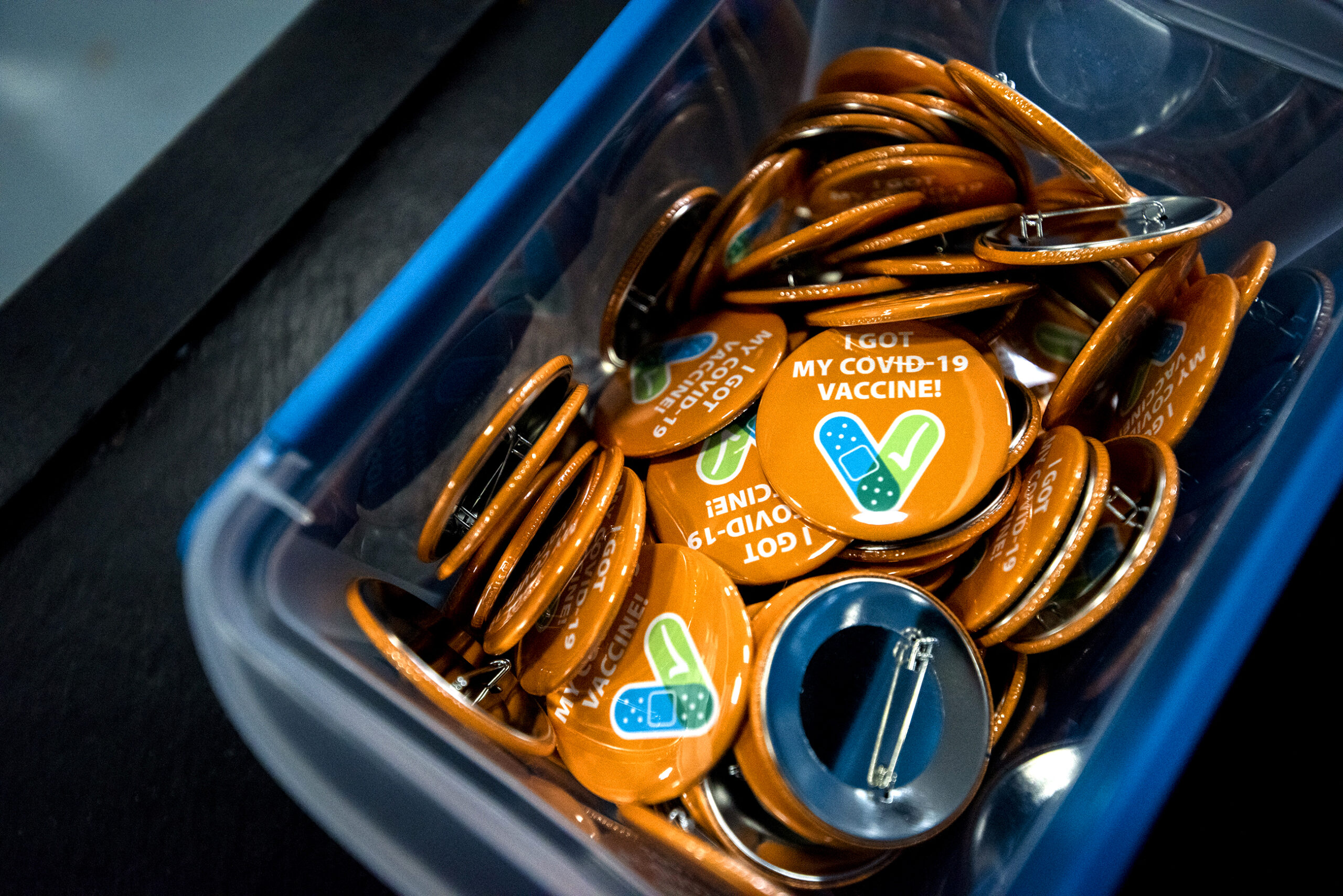 Orange buttons in a box say "I got my COVID-10 vaccine!" on them.