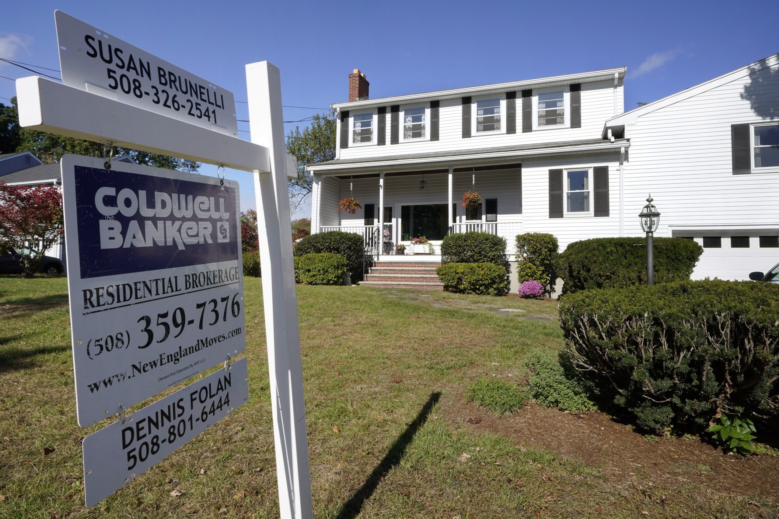 Sign in front of home for sale