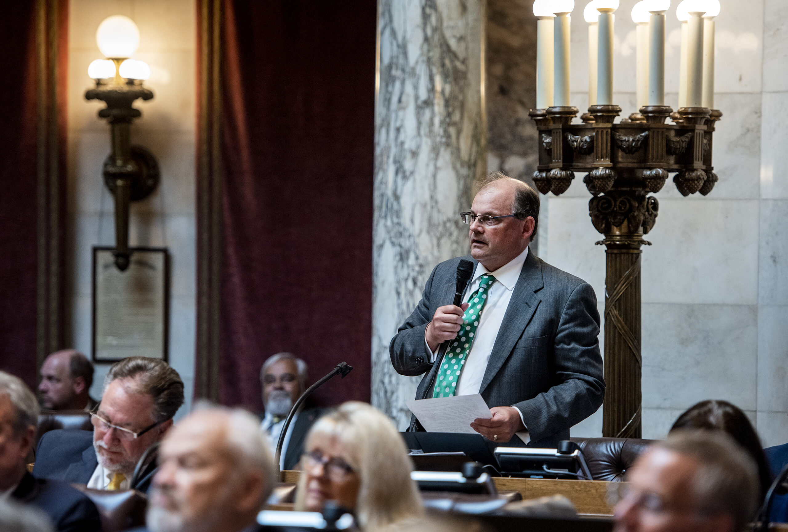 Rep. Michael Schraa speaks from the back of the chamber.