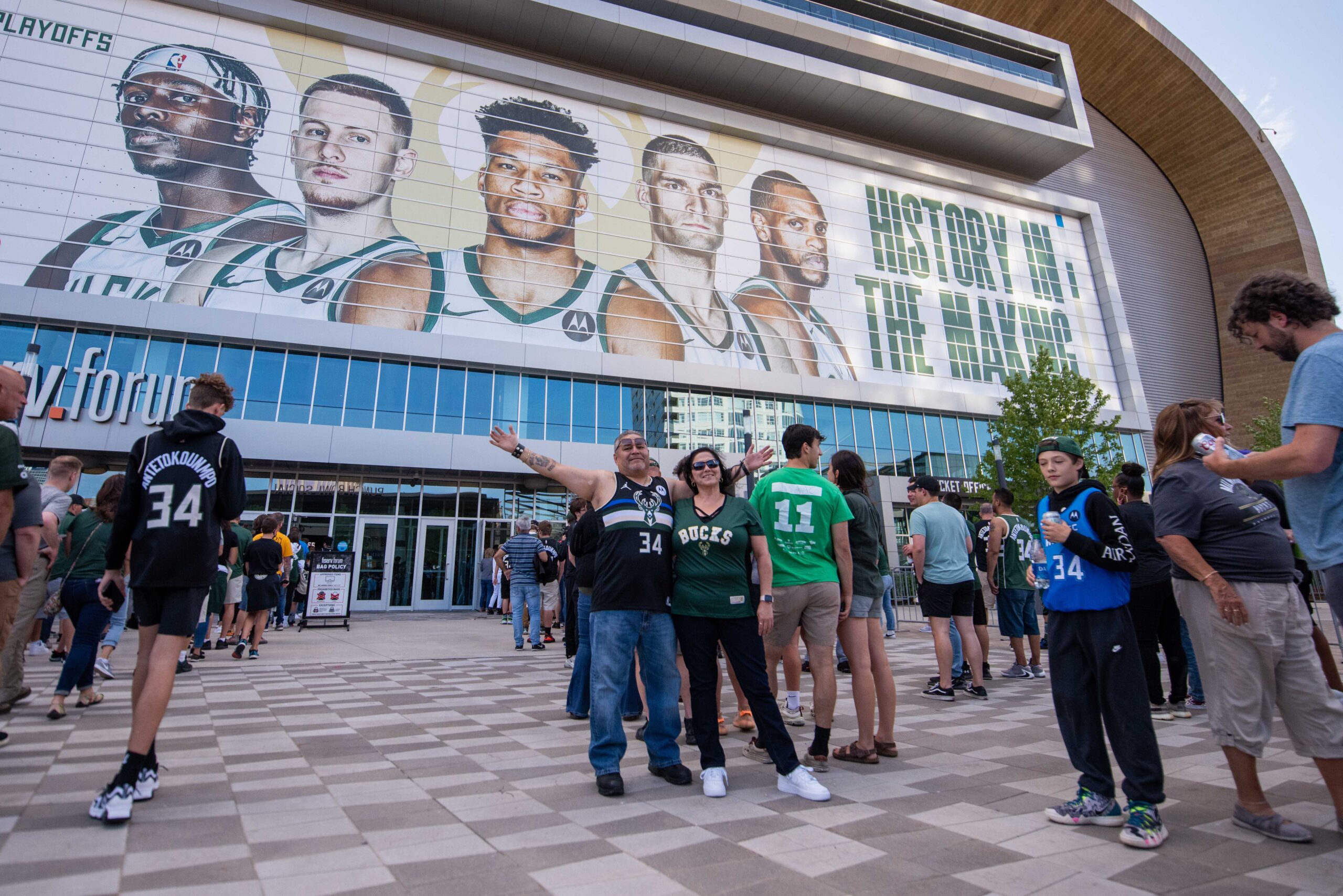 People gather outside the Fiserv Forum