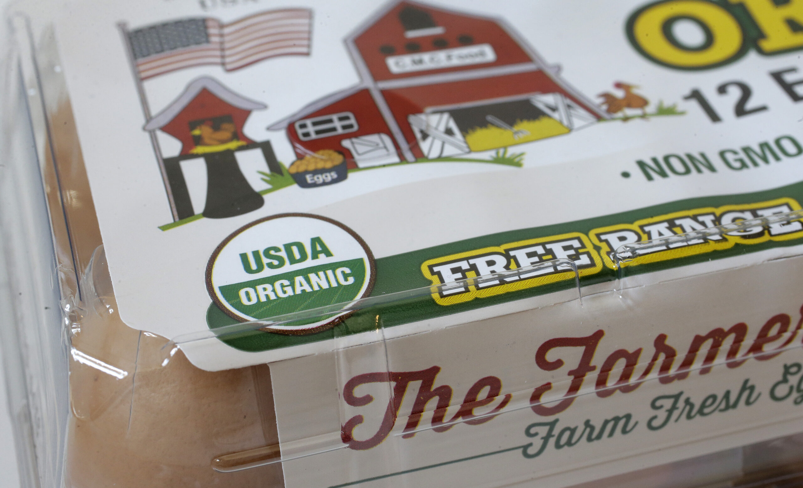 "USDA Organic" label is printed on the label of a carton of a dozen eggs