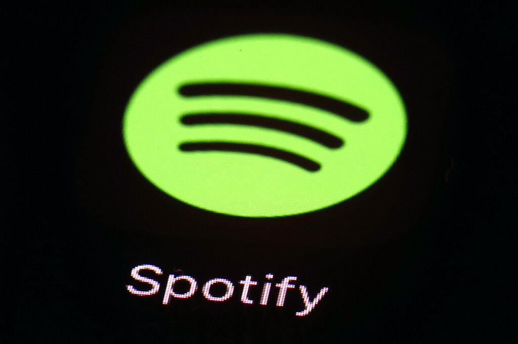 The green Spotify logo against a black background.