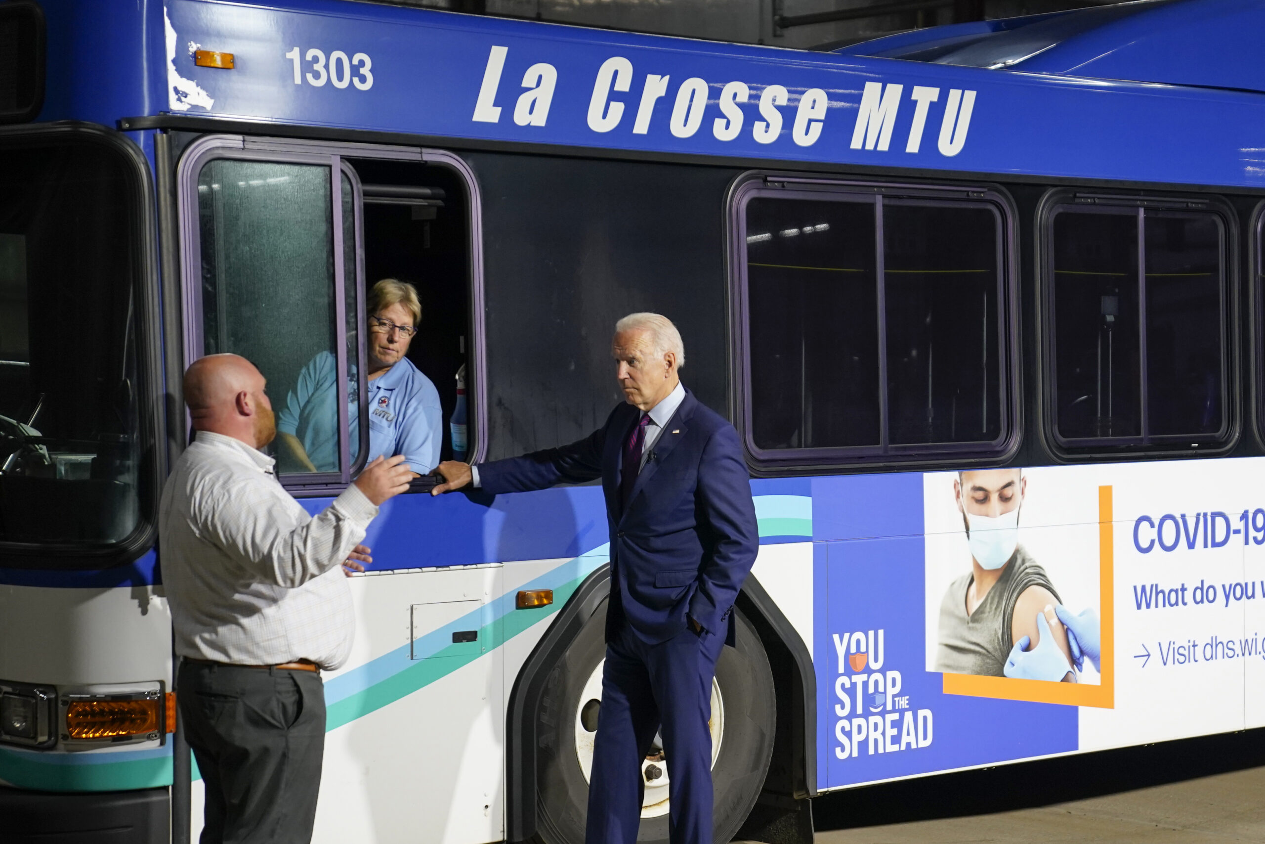 President Joe Biden participates in a tour of the La Crosse Municipal Transit Authority