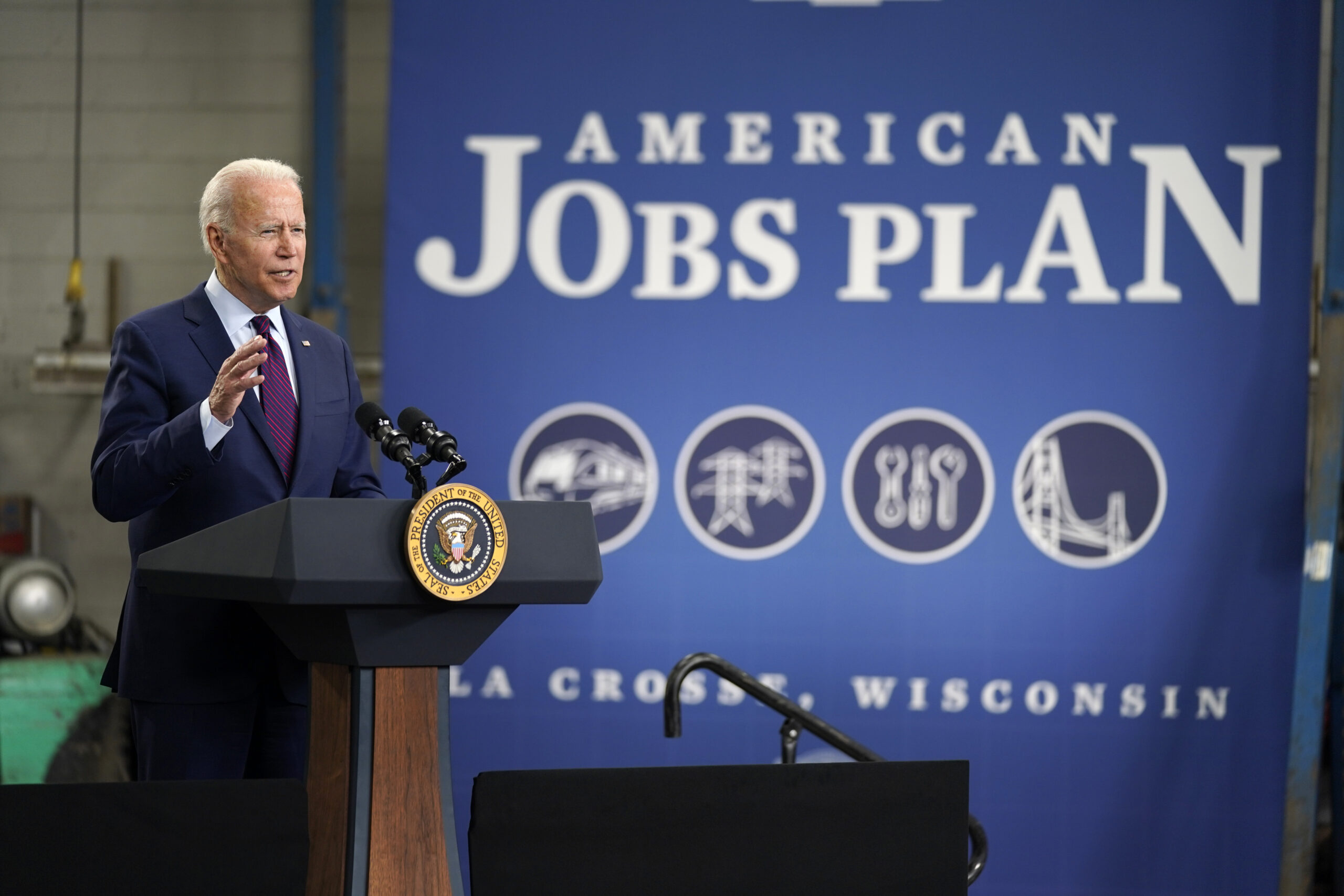 President Joe Biden speaks about infrastructure spending at the La Crosse Municipal Transit Authority