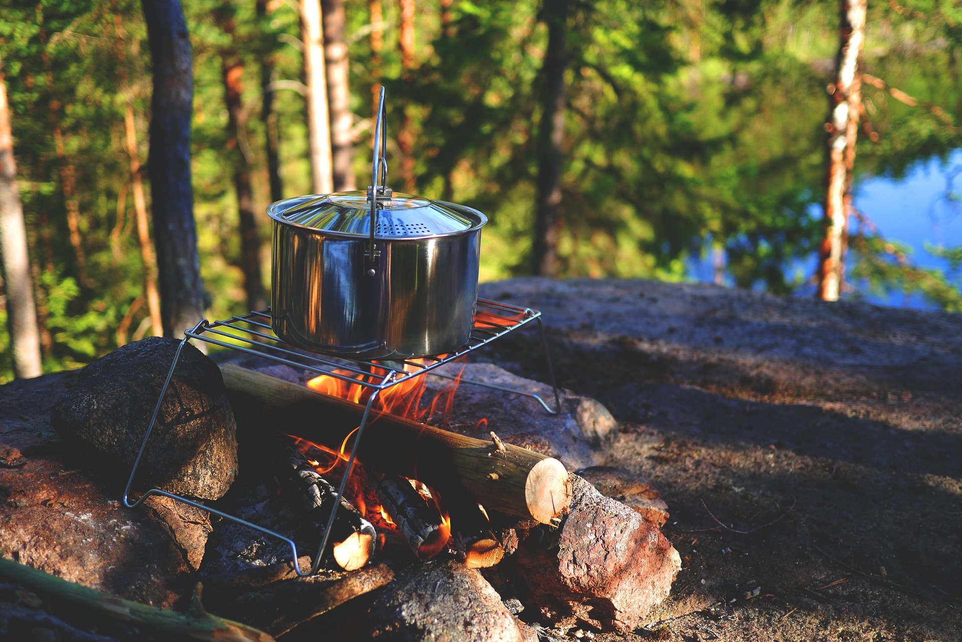 Campfire with cooking pot.