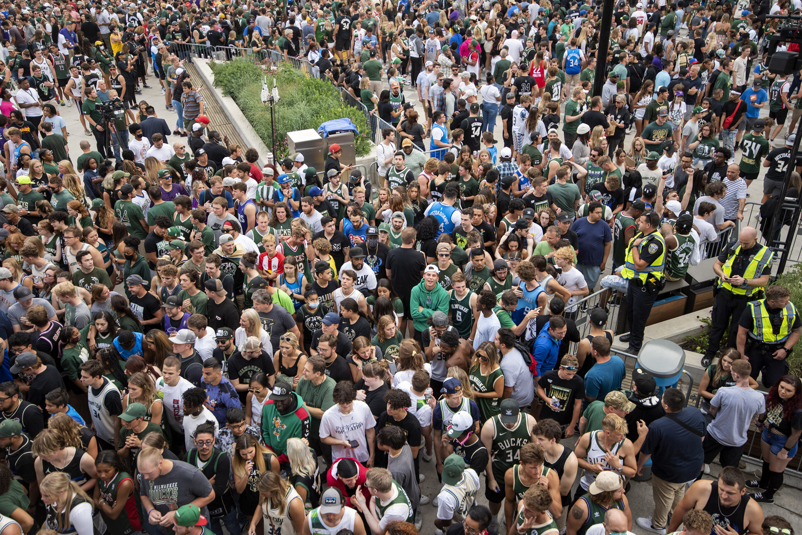 A sea of fans can be seen from above.