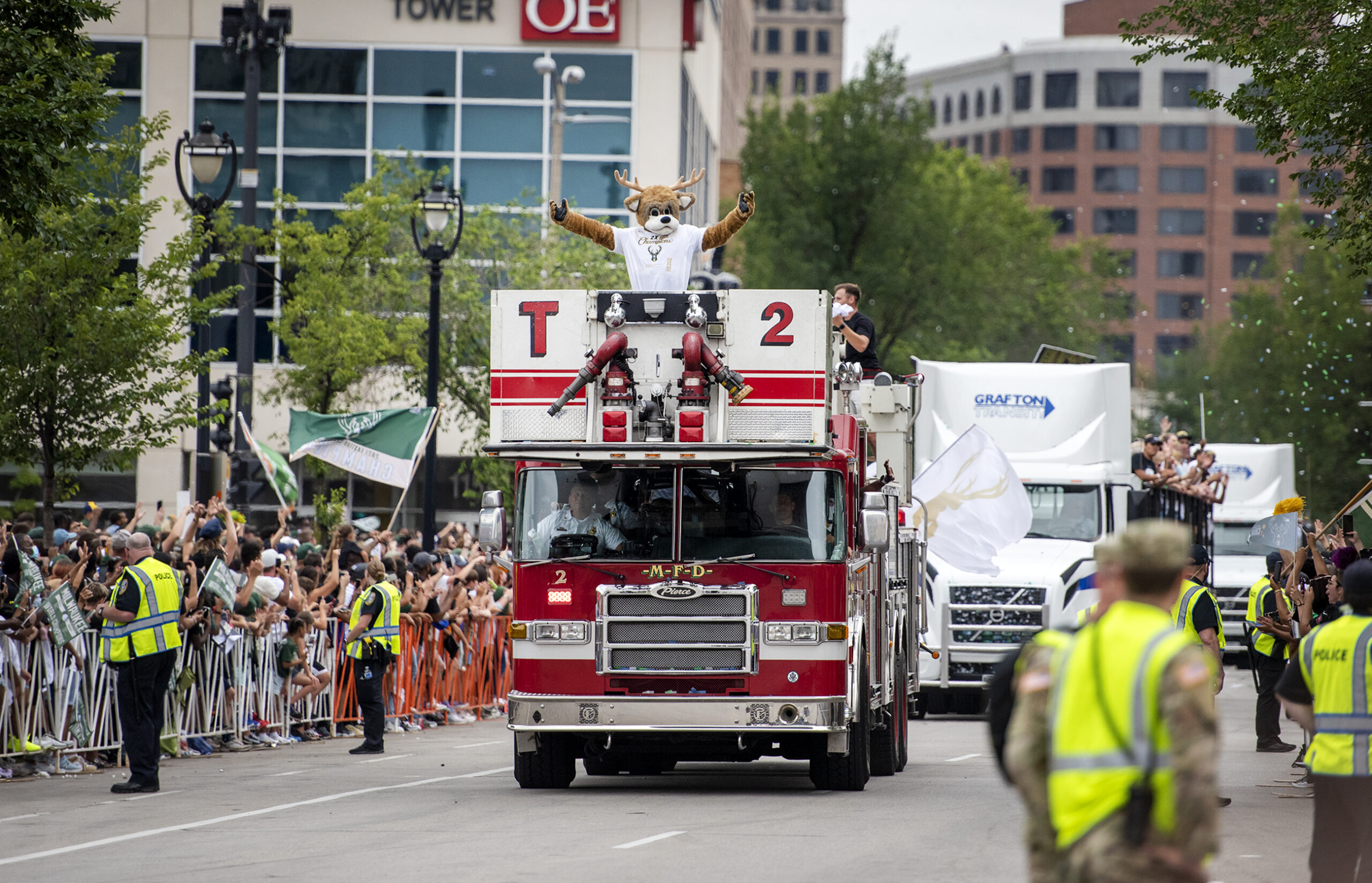 Bango sits on top of a fire truck.