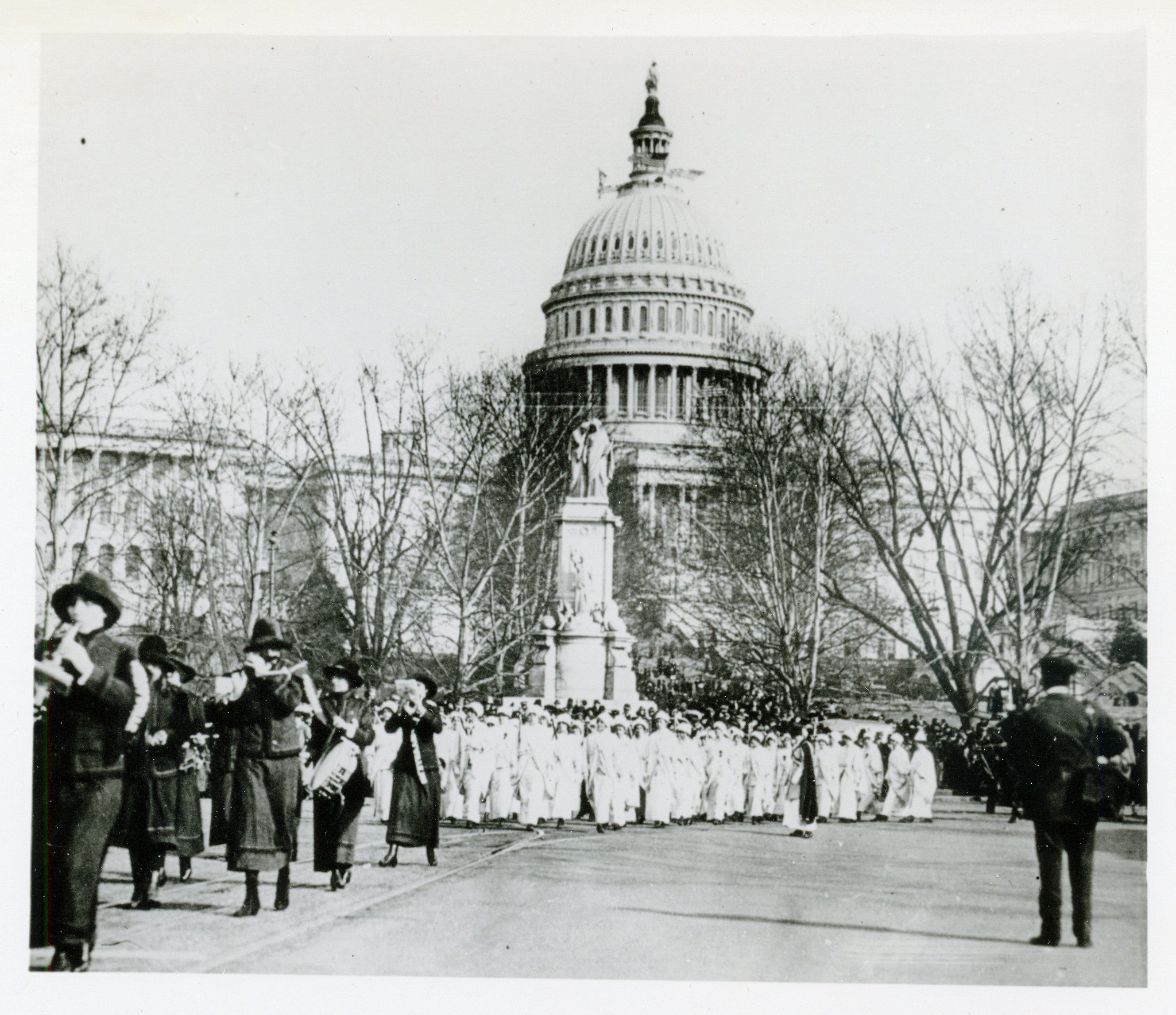 Women march on Pennsylvania Avenue on March 3, 1913 demanding the right to vote