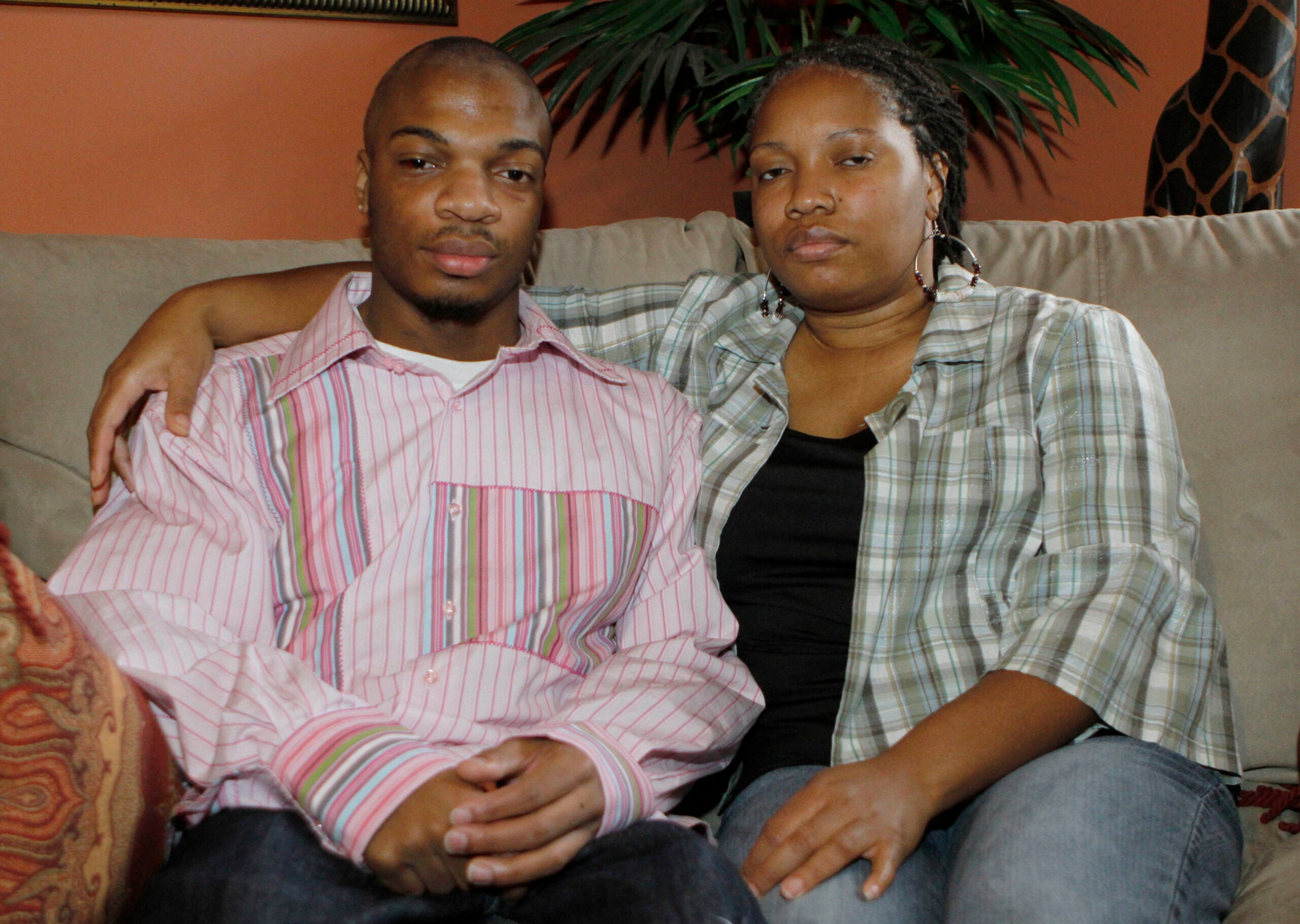 Jordan and Terez Miles sitting in their home