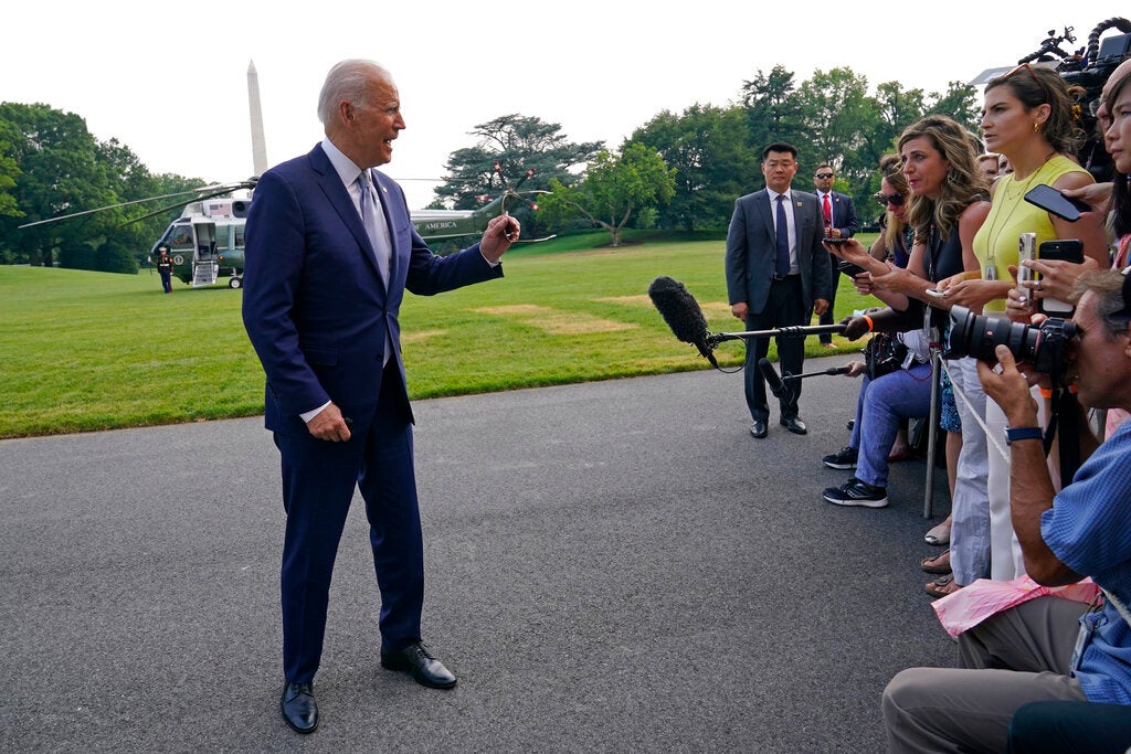 President Joe Biden briefly talks to reporters