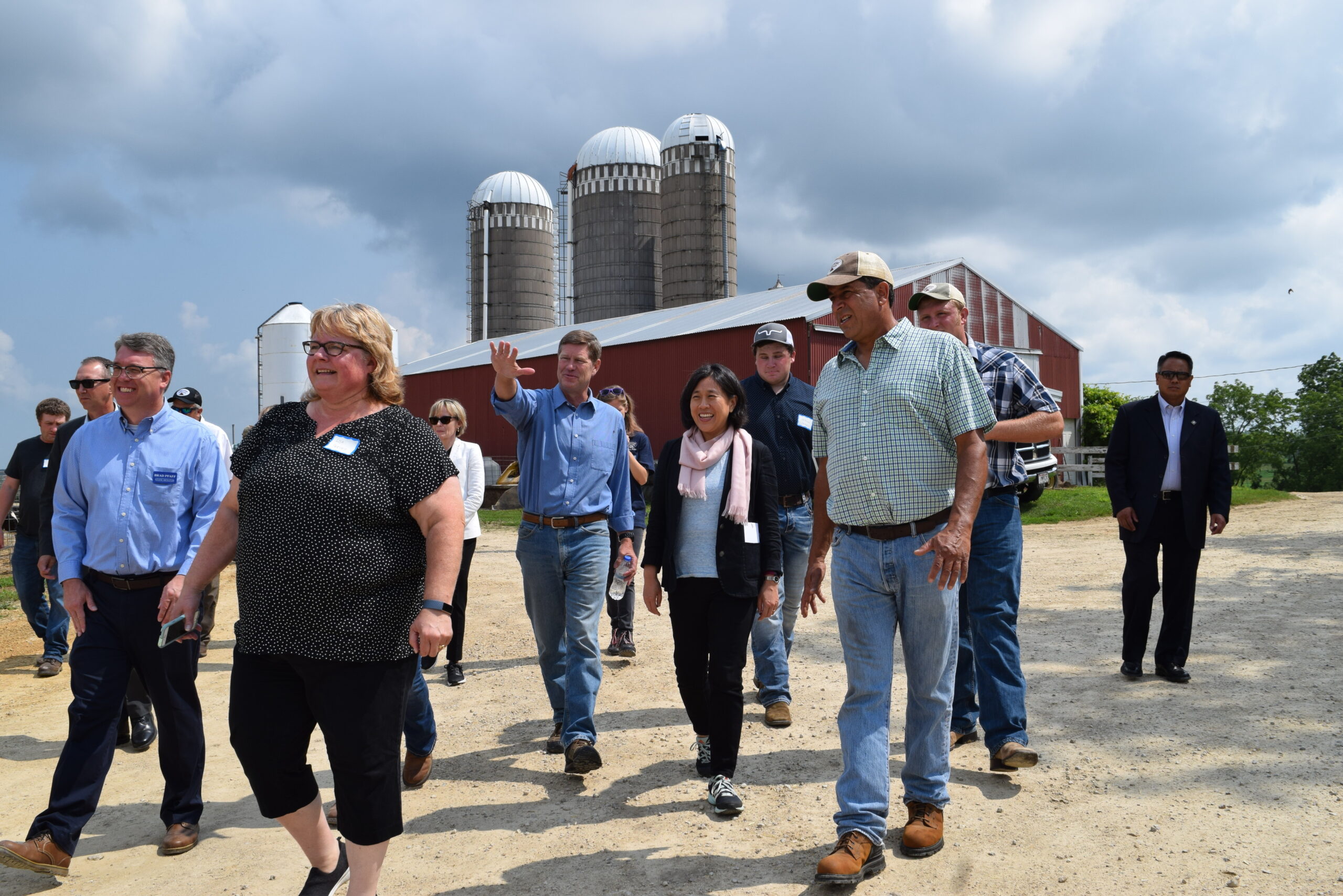 Katherine Tai and Ron Kind on the Servais family dairy farm in Stoddard