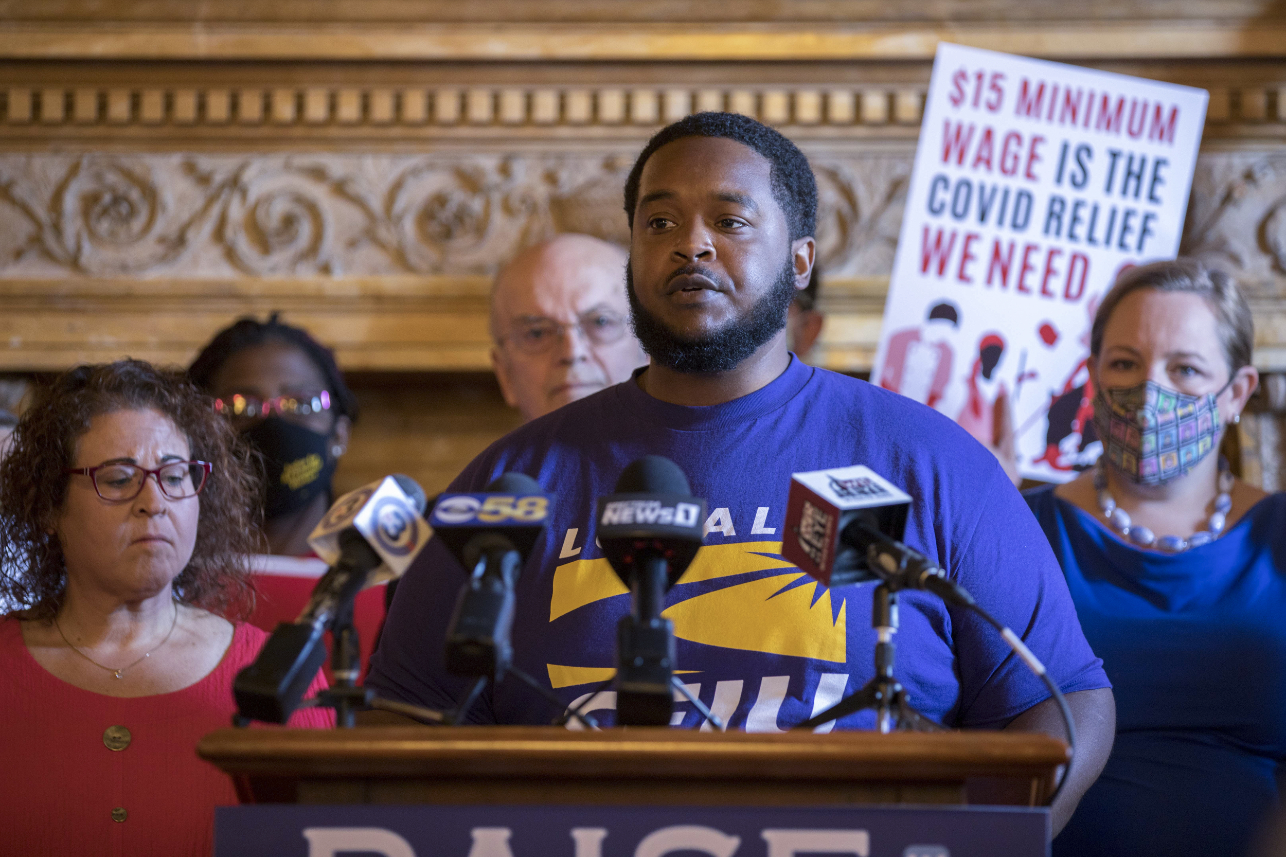 James Rudd, member of SEIU Local 1, speaks at a press conference at the state Capitol