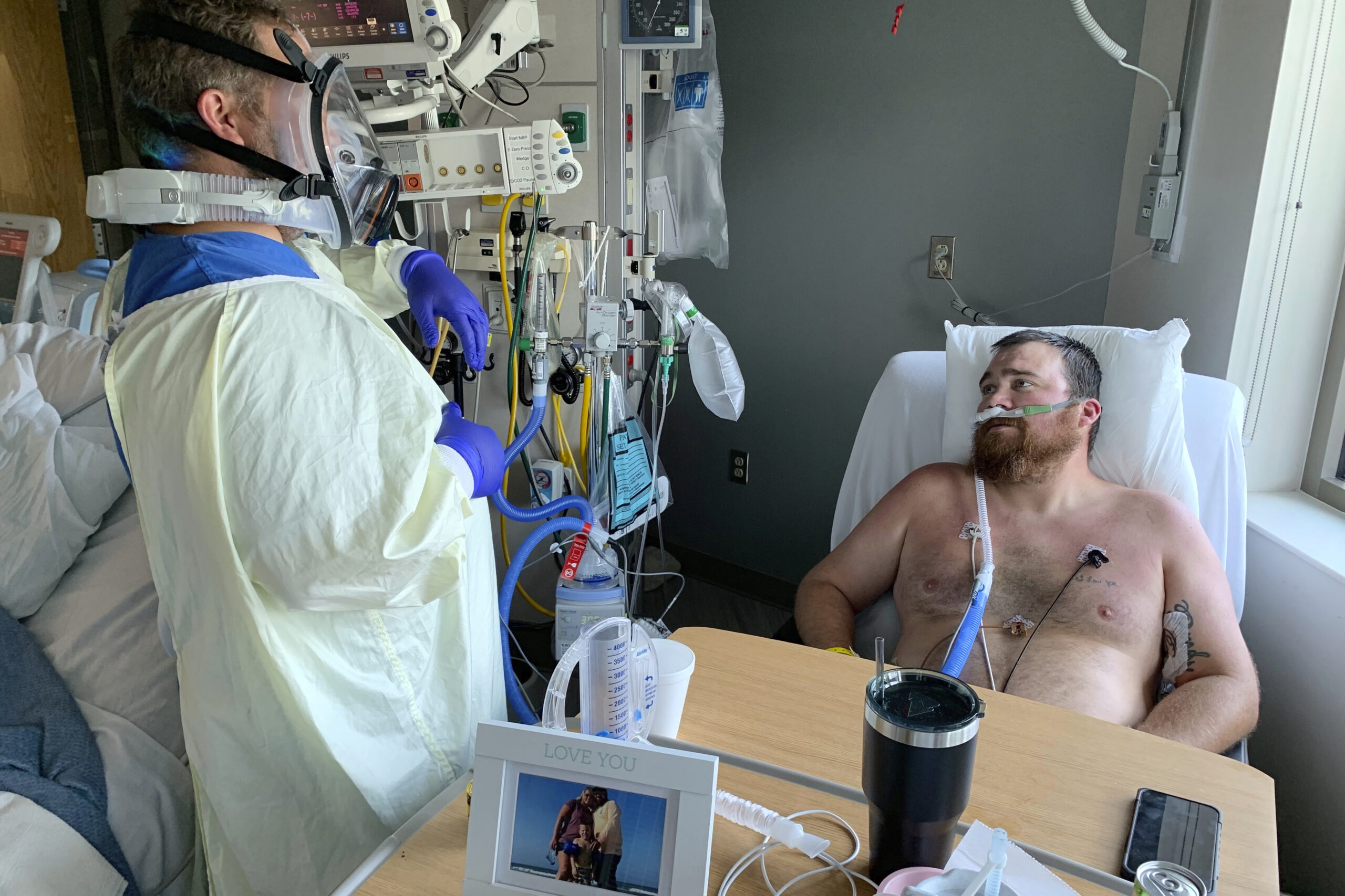 Registered Nurse Chris Murphy walks 31-year-old Daryl Barker through breathing techniques