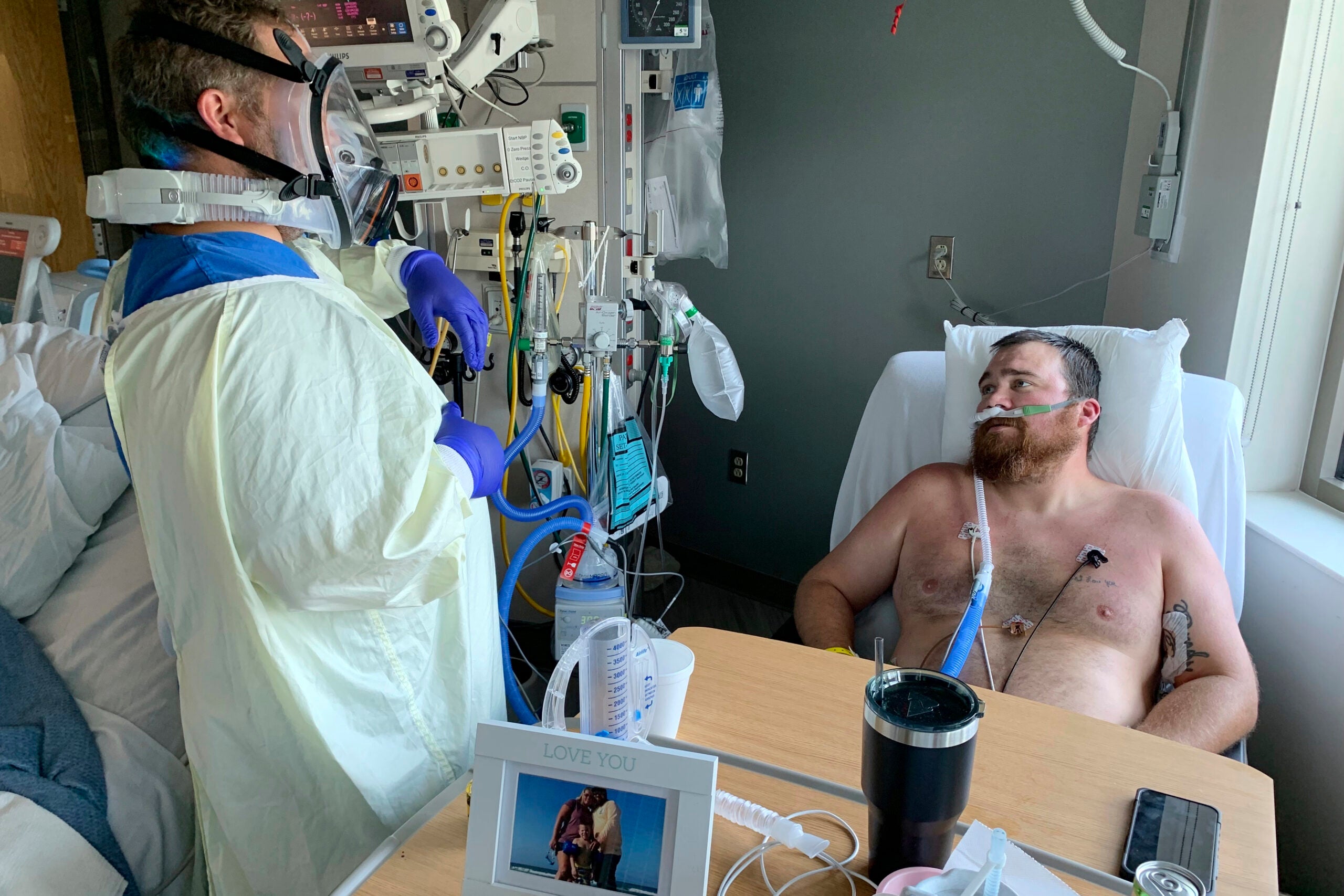 Registered Nurse Chris Murphy walks 31-year-old Daryl Barker through breathing techniques