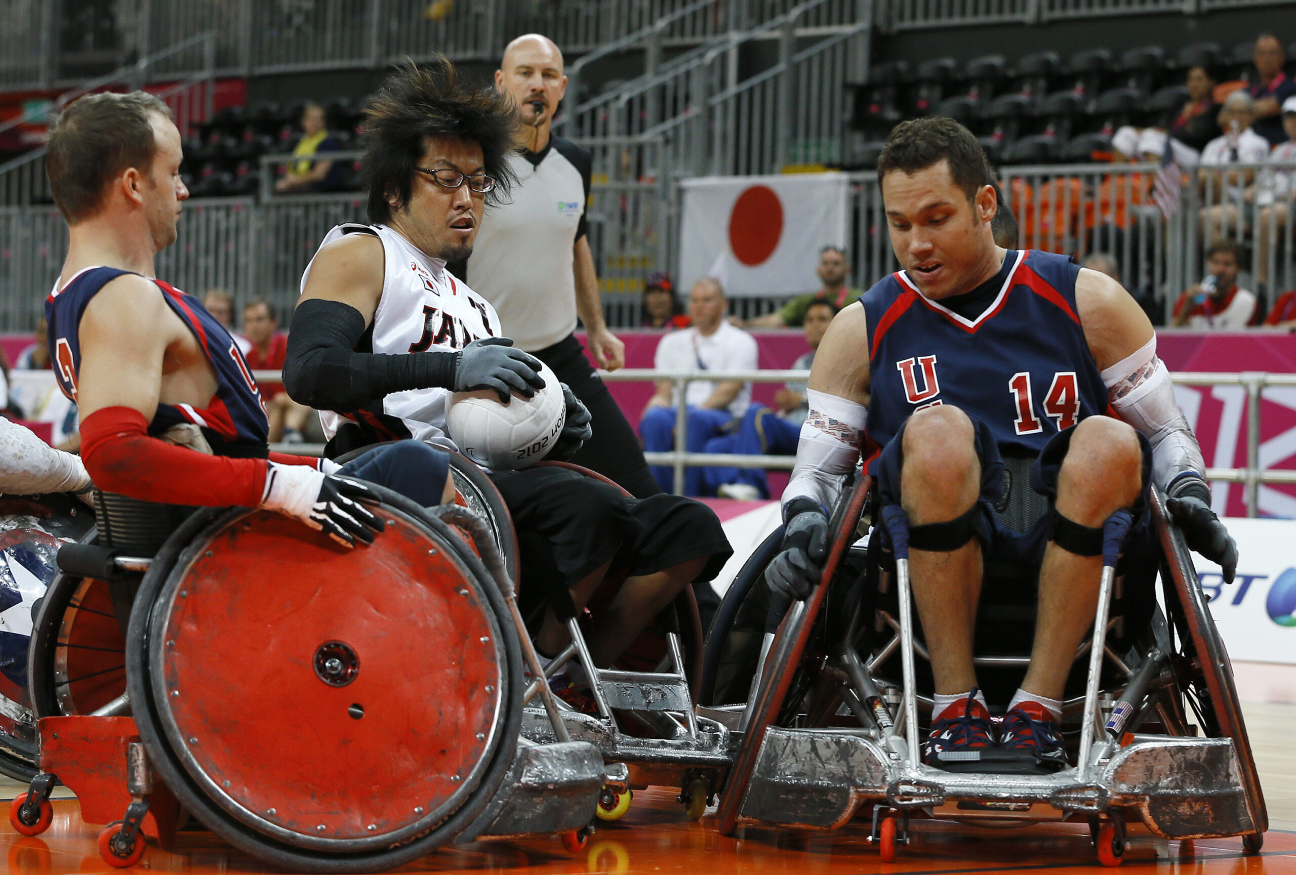 Derrick Helton and Joe Delagrave of the United States block Daisuke Ikezaki's attempt to score for Japan