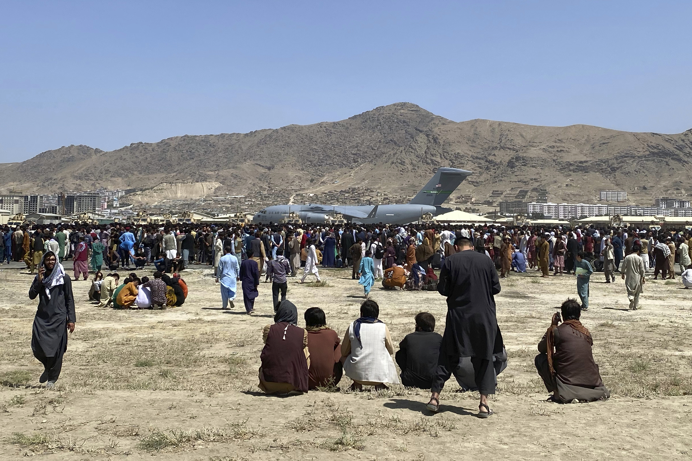 Afghans at the airport in Kabul trying to leave the country