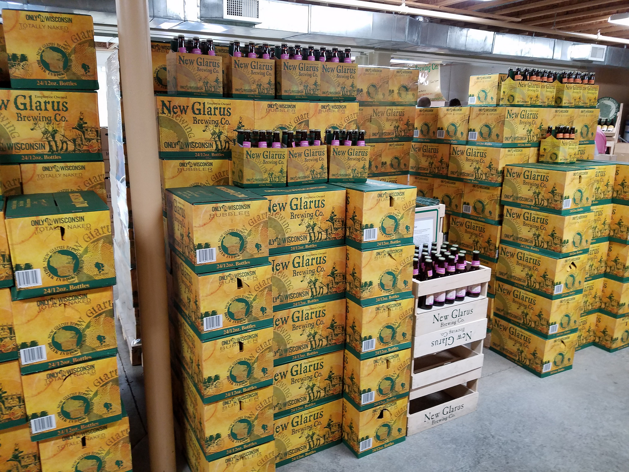 Stacks of New Glarus beer in a store