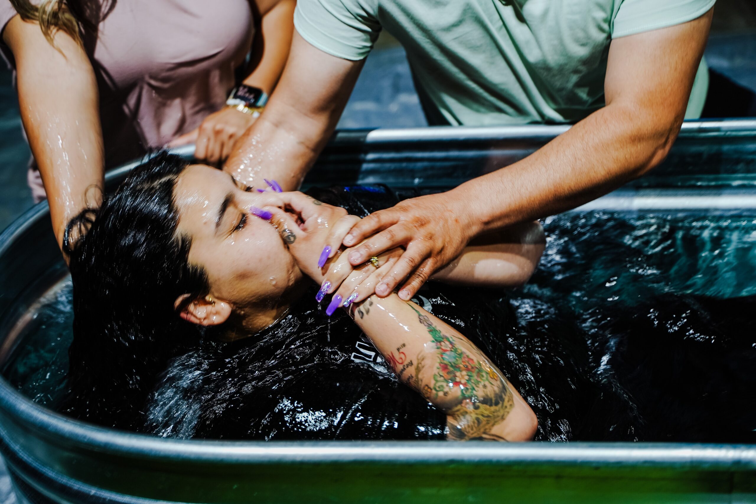 A woman being Baptized