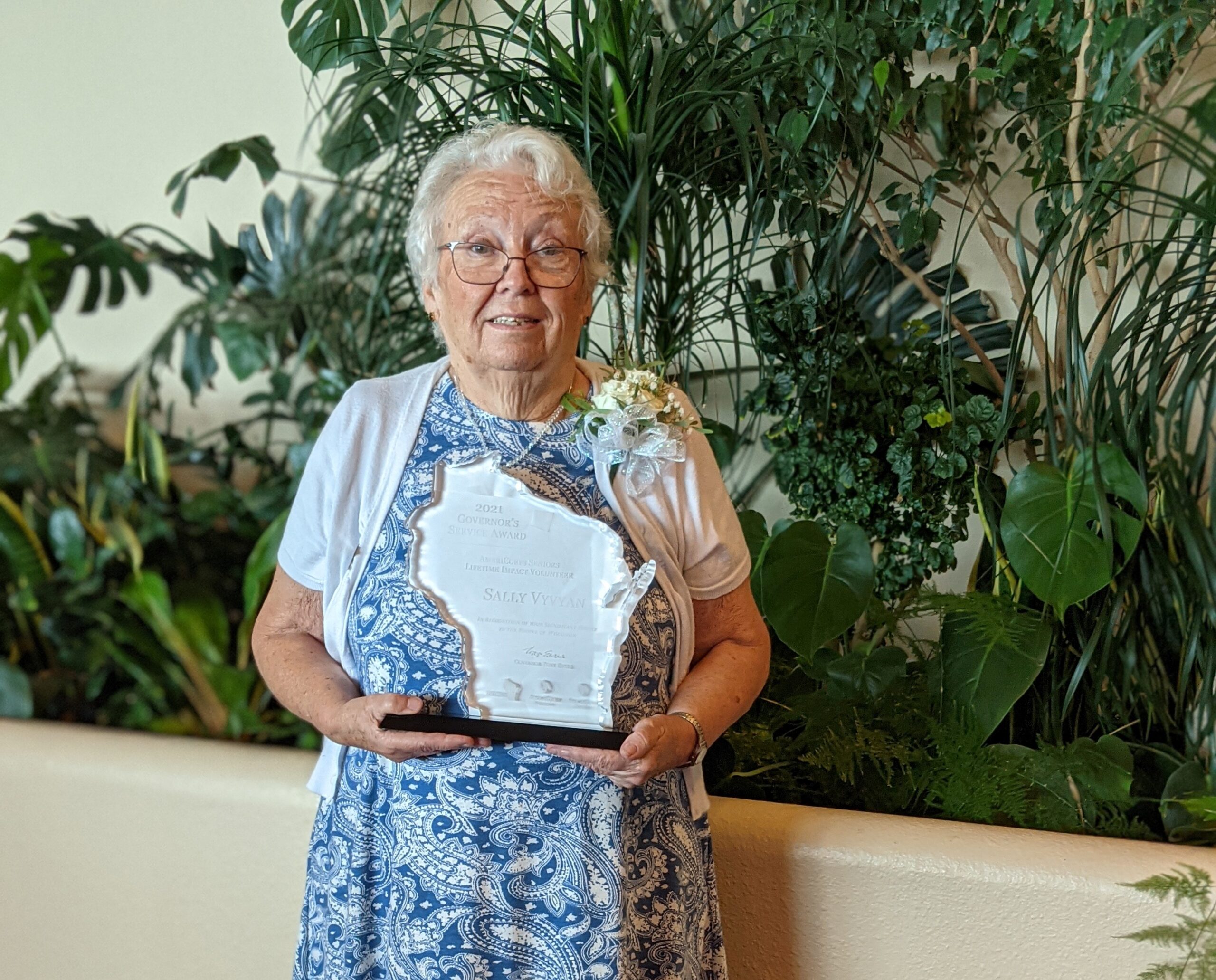 Westby Foster Grandparent Sally Vyvyan poses in Madison with her Governor's Service Award, August 2021; Image courtesy of Southwest Community Action Program.