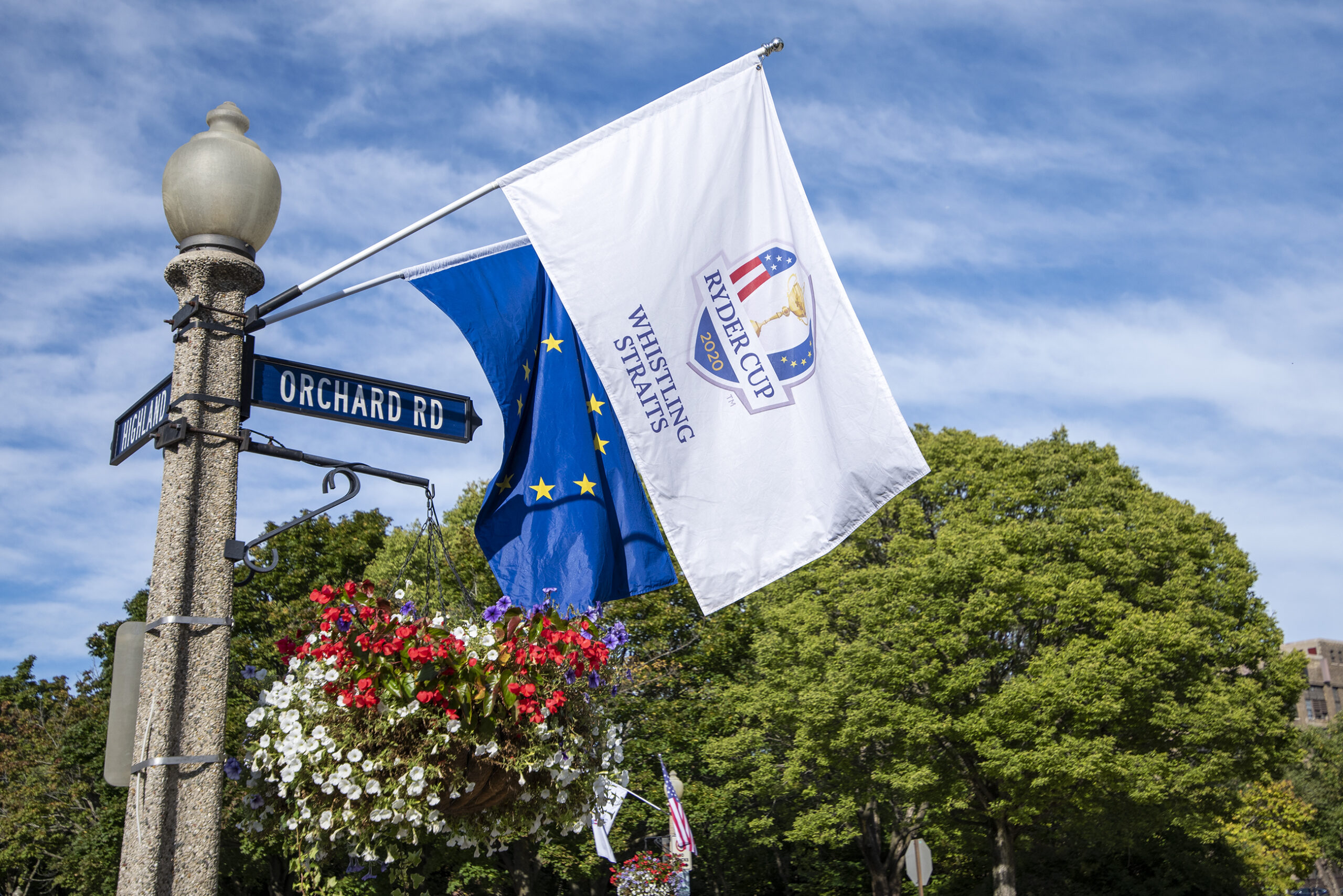A white flag has the Ryder Cup logo on it.