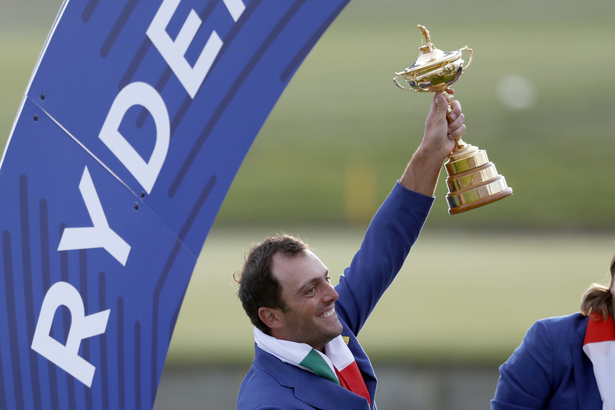 Francesco Molinari holds up the trophy after European team won the 2018 Ryder Cup golf tournament