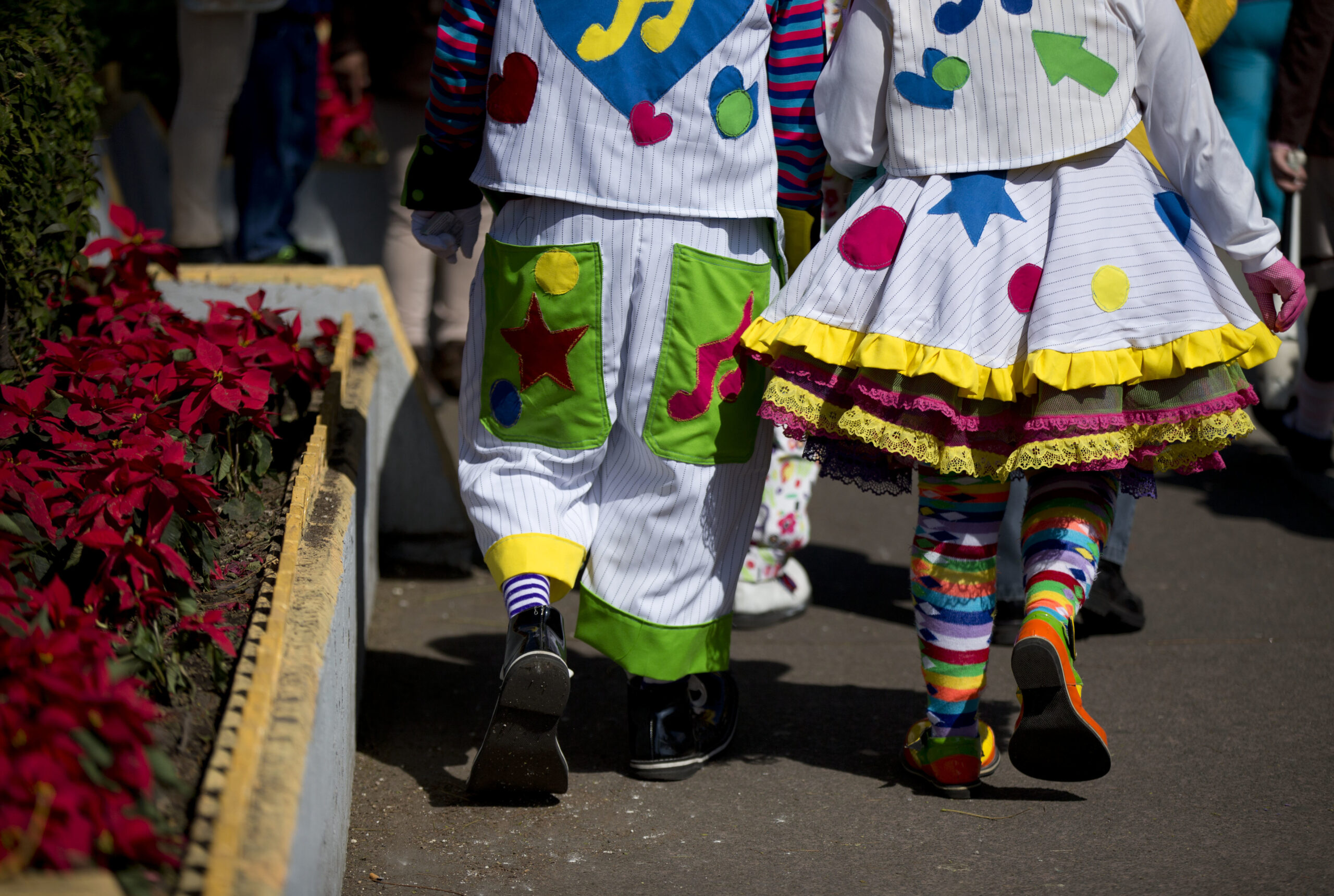 Clowns march together toward the Basilica of Our Lady of Guadalupe in Mexico City