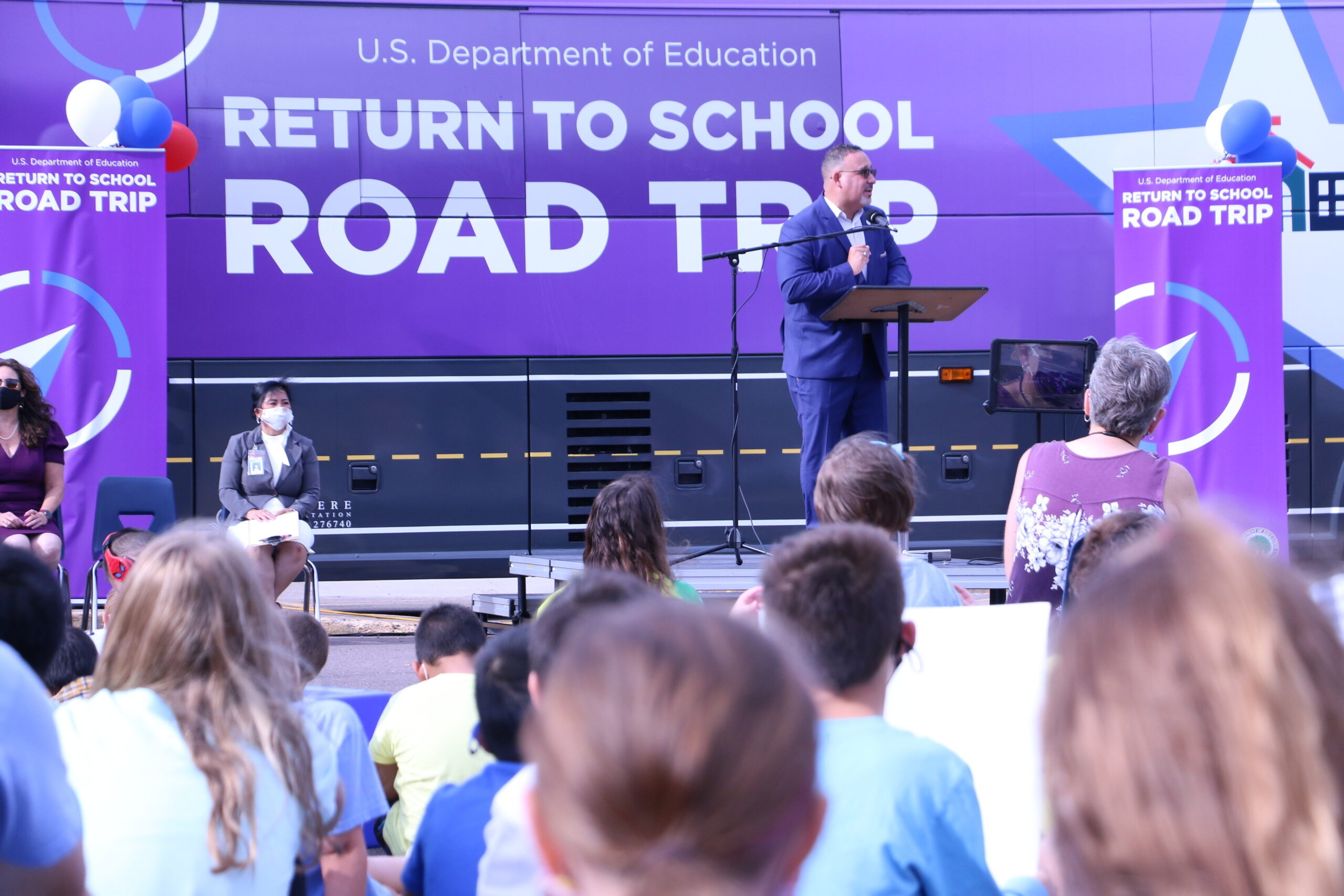 U.S. Department of Education Secretary Miguel Cardona speaks to elementary school students and staff at Eau Claire's Locust Lane Elementary
