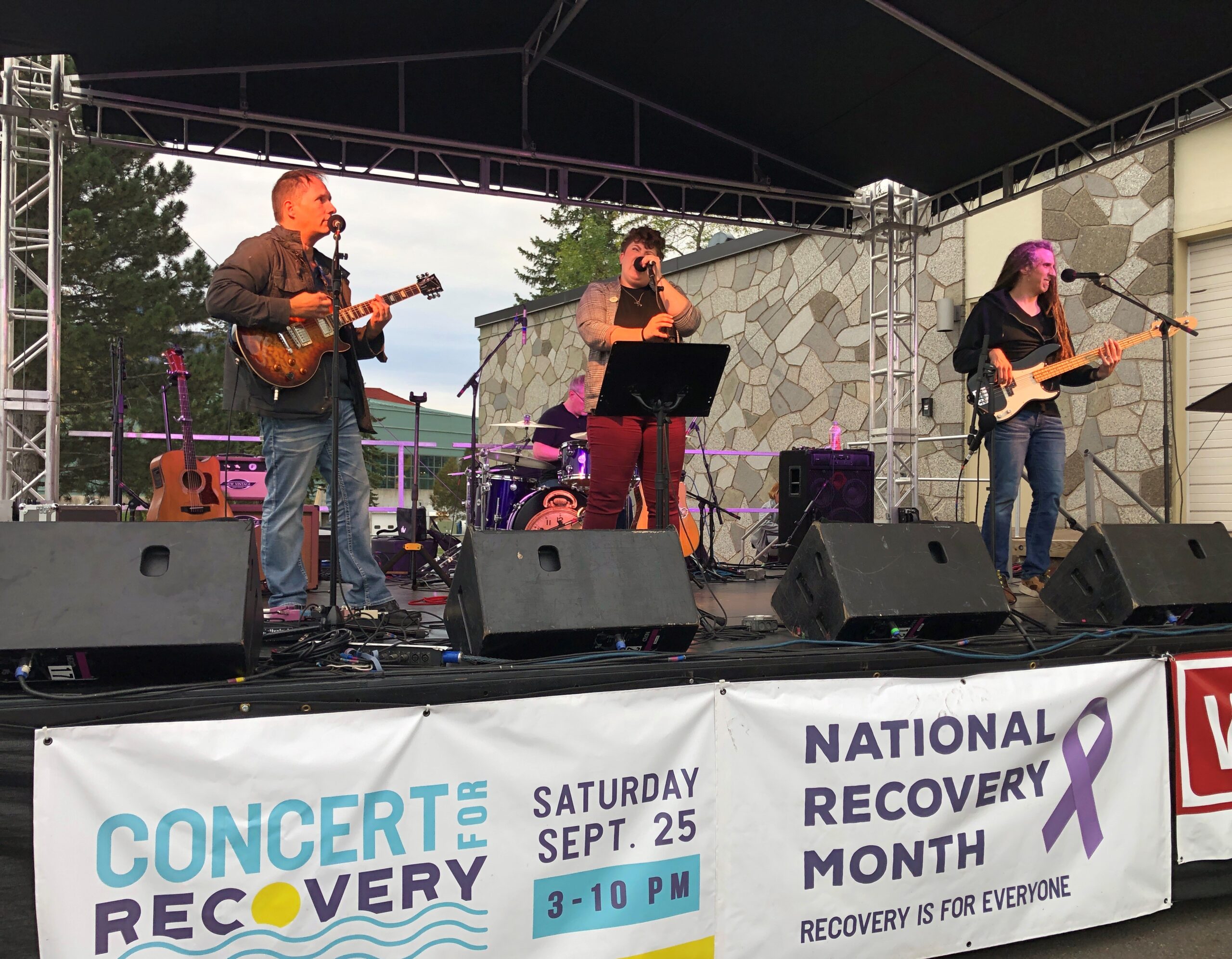 The band South of Superior performs at Concert for Recovery; R. Washington, 2021.